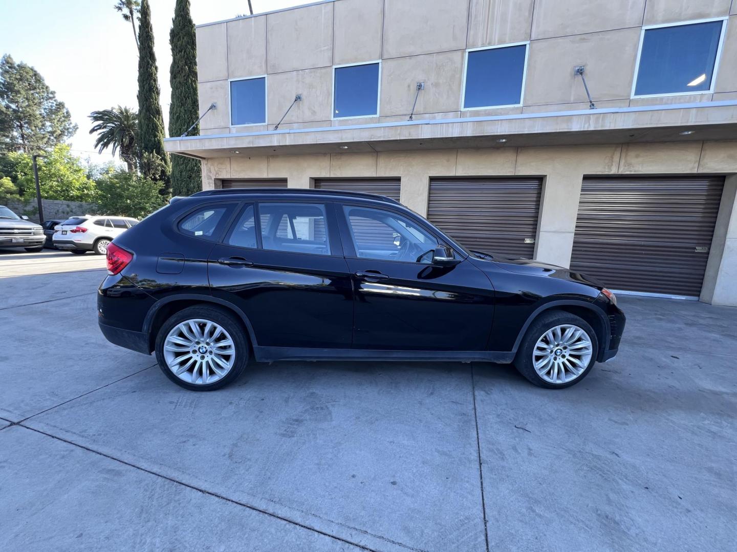 2015 BLACK /Black BMW X1 sDrive28i (WBAVM1C50FV) with an 2.0L L4 DOHC 16V engine, 8-Speed Automatic transmission, located at 30 S. Berkeley Avenue, Pasadena, CA, 91107, (626) 248-7567, 34.145447, -118.109398 - Low Mileage 2015 BMW X1 sDrive28i – Buy Here Pay Here – Bad Credit OK – Pasadena Dealer Looking for a sporty, luxury SUV with low miles and affordable financing? Check out this 2015 BMW X1 sDrive28i in excellent condition, now available at Crown City Motors in Pasadena, CA. With just 70,062 - Photo#2
