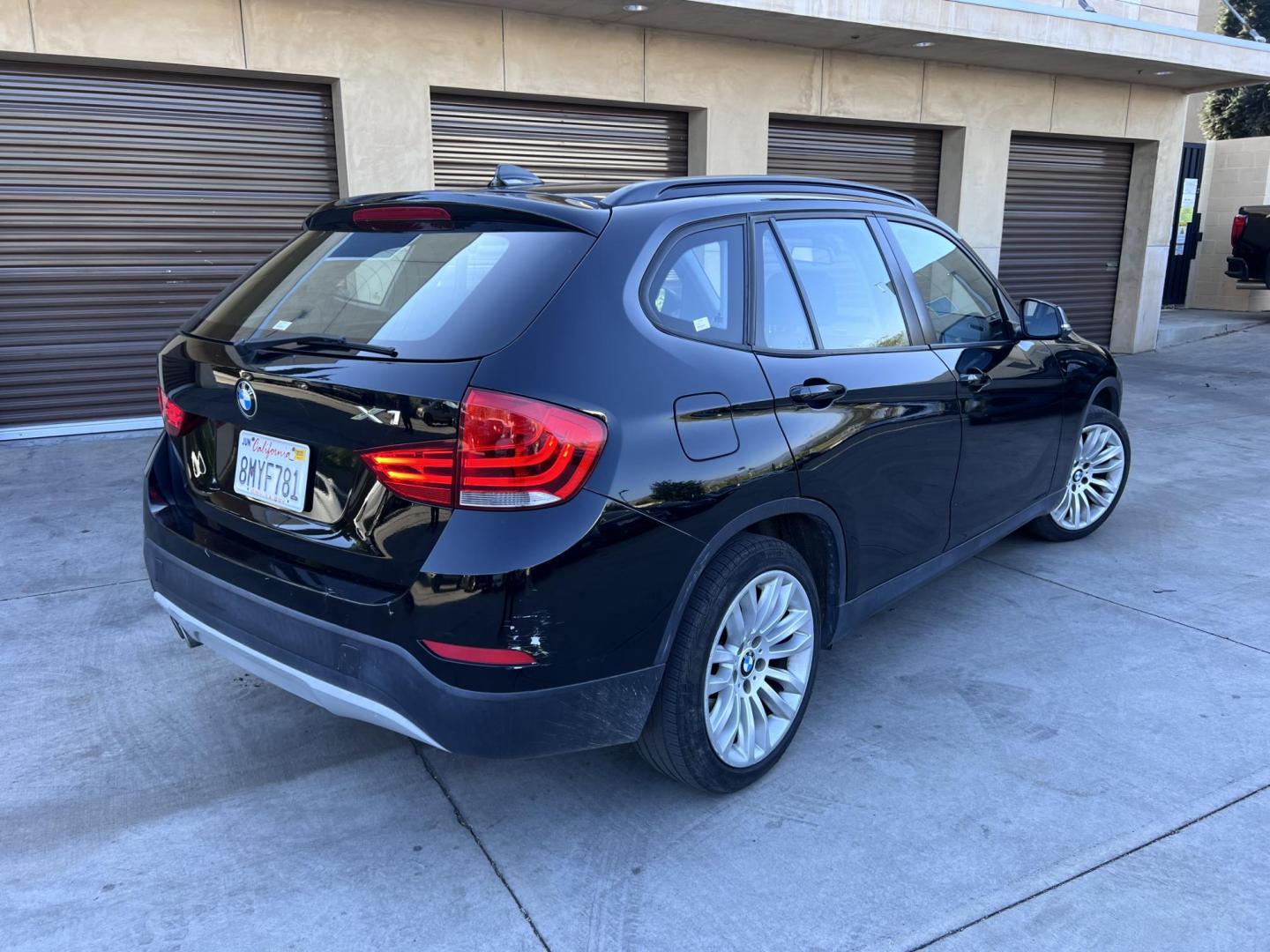 2015 BLACK /Black BMW X1 sDrive28i (WBAVM1C50FV) with an 2.0L L4 DOHC 16V engine, 8-Speed Automatic transmission, located at 30 S. Berkeley Avenue, Pasadena, CA, 91107, (626) 248-7567, 34.145447, -118.109398 - Low Mileage 2015 BMW X1 sDrive28i – Buy Here Pay Here – Bad Credit OK – Pasadena Dealer Looking for a sporty, luxury SUV with low miles and affordable financing? Check out this 2015 BMW X1 sDrive28i in excellent condition, now available at Crown City Motors in Pasadena, CA. With just 70,062 - Photo#1