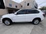 2015 Alpine White /Tan BMW X5 xDrive35i (5UXKR0C59F0) with an 3.0L L6 DOHC 24V engine, 8-Speed Automatic transmission, located at 30 S. Berkeley Avenue, Pasadena, CA, 91107, (626) 248-7567, 34.145447, -118.109398 - 2015 BMW X5 xDrive35i – Luxury 3rd Row SUV | Buy Here Pay Here – Pasadena, CA Drive home in power, luxury, and confidence with this 2015 BMW X5 xDrive35i, available now at Crown City Motors—Pasadena’s trusted source for Buy Here Pay Here (BHPH) financing. This all-wheel-drive SUV blends BMW - Photo#7