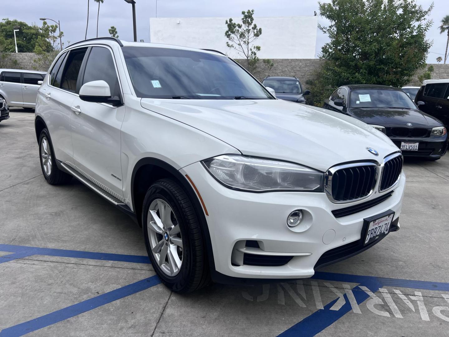 2015 Alpine White /Tan BMW X5 xDrive35i (5UXKR0C59F0) with an 3.0L L6 DOHC 24V engine, 8-Speed Automatic transmission, located at 30 S. Berkeley Avenue, Pasadena, CA, 91107, (626) 248-7567, 34.145447, -118.109398 - 2015 BMW X5 xDrive35i – Luxury 3rd Row SUV | Buy Here Pay Here – Pasadena, CA Drive home in power, luxury, and confidence with this 2015 BMW X5 xDrive35i, available now at Crown City Motors—Pasadena’s trusted source for Buy Here Pay Here (BHPH) financing. This all-wheel-drive SUV blends BMW - Photo#12