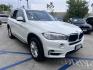 2015 Alpine White /Tan BMW X5 xDrive35i (5UXKR0C59F0) with an 3.0L L6 DOHC 24V engine, 8-Speed Automatic transmission, located at 30 S. Berkeley Avenue, Pasadena, CA, 91107, (626) 248-7567, 34.145447, -118.109398 - 2015 BMW X5 xDrive35i – Luxury 3rd Row SUV | Buy Here Pay Here – Pasadena, CA Drive home in power, luxury, and confidence with this 2015 BMW X5 xDrive35i, available now at Crown City Motors—Pasadena’s trusted source for Buy Here Pay Here (BHPH) financing. This all-wheel-drive SUV blends BMW - Photo#12