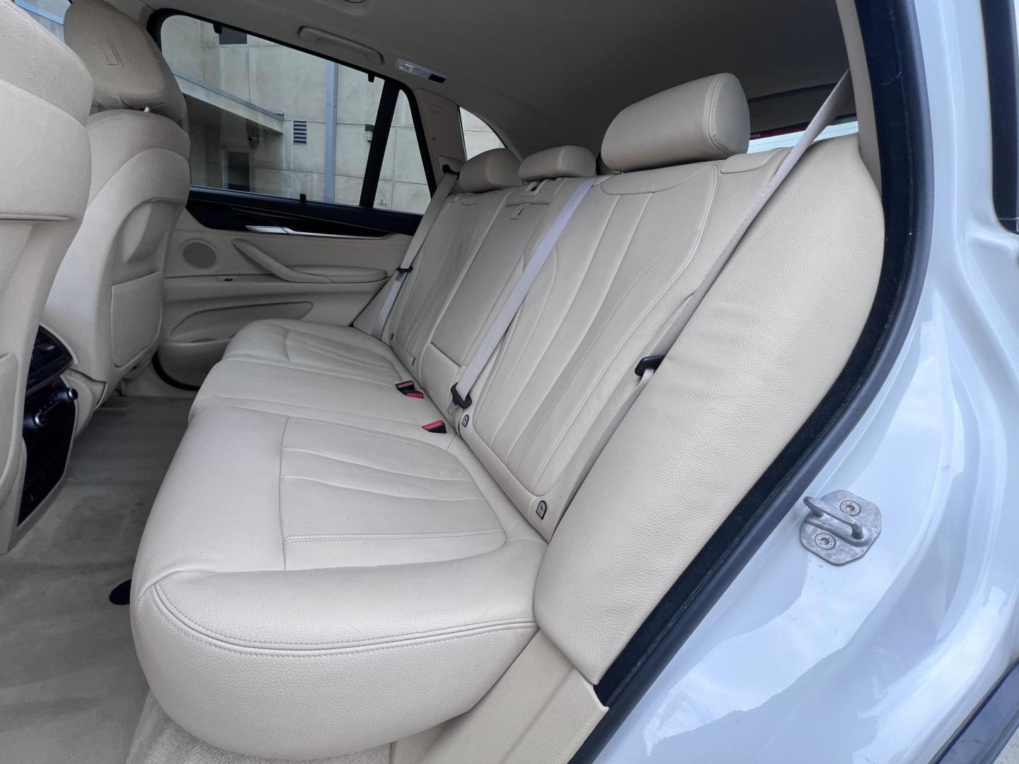 2015 Alpine White /Tan BMW X5 xDrive35i (5UXKR0C59F0) with an 3.0L L6 DOHC 24V engine, 8-Speed Automatic transmission, located at 30 S. Berkeley Avenue, Pasadena, CA, 91107, (626) 248-7567, 34.145447, -118.109398 - 2015 BMW X5 xDrive35i – Luxury 3rd Row SUV | Buy Here Pay Here – Pasadena, CA Drive home in power, luxury, and confidence with this 2015 BMW X5 xDrive35i, available now at Crown City Motors—Pasadena’s trusted source for Buy Here Pay Here (BHPH) financing. This all-wheel-drive SUV blends BMW - Photo#18