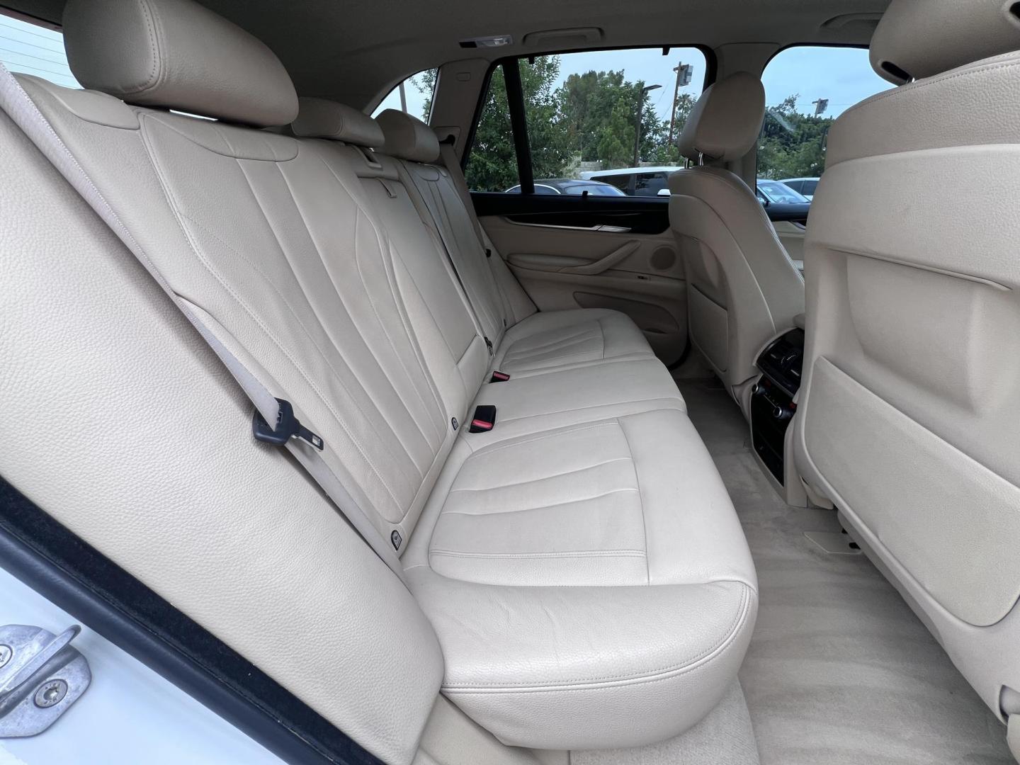 2015 Alpine White /Tan BMW X5 xDrive35i (5UXKR0C59F0) with an 3.0L L6 DOHC 24V engine, 8-Speed Automatic transmission, located at 30 S. Berkeley Avenue, Pasadena, CA, 91107, (626) 248-7567, 34.145447, -118.109398 - 2015 BMW X5 xDrive35i – Luxury 3rd Row SUV | Buy Here Pay Here – Pasadena, CA Drive home in power, luxury, and confidence with this 2015 BMW X5 xDrive35i, available now at Crown City Motors—Pasadena’s trusted source for Buy Here Pay Here (BHPH) financing. This all-wheel-drive SUV blends BMW - Photo#25