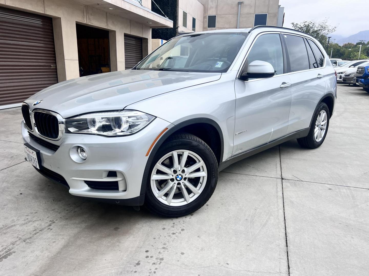 2015 Silver Metallic /black BMW X5 sDrive35i (5UXKR2C55F0) with an 3.0L L6 DOHC 24V engine, 8-Speed Automatic transmission, located at 30 S. Berkeley Avenue, Pasadena, CA, 91107, (626) 248-7567, 34.145447, -118.109398 - Crown City Motors is a used “Buy Here Pay Here” car dealer in Pasadena CA. “Buy Here Pay Here” financing, means that when you purchase your vehicle from our dealership, that you make the payments to the dealership as well. We do not need the banks approval to get you approved for a used auto - Photo#0