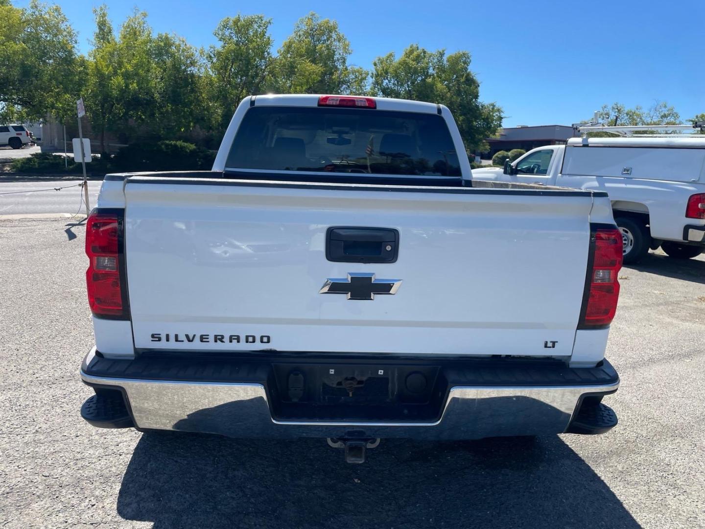 2015 Summit White Chevrolet Silverado 1500 LT (3GCUKREC8FG) with an 5.3L EcoTec3 5.3L V8 355hp 383ft. lbs. Direct Injection engine, 6-Speed Shiftable Automatic w/Overdrive transmission, located at 800 Riverside Ave, Roseville, CA, 95678, 916-773-4549 & Toll Free: 866-719-4393, 38.732265, -121.291039 - 4X4 CREW CAB LT SERVICE RECORDS ON CLEAN CARFAX- Photo#7