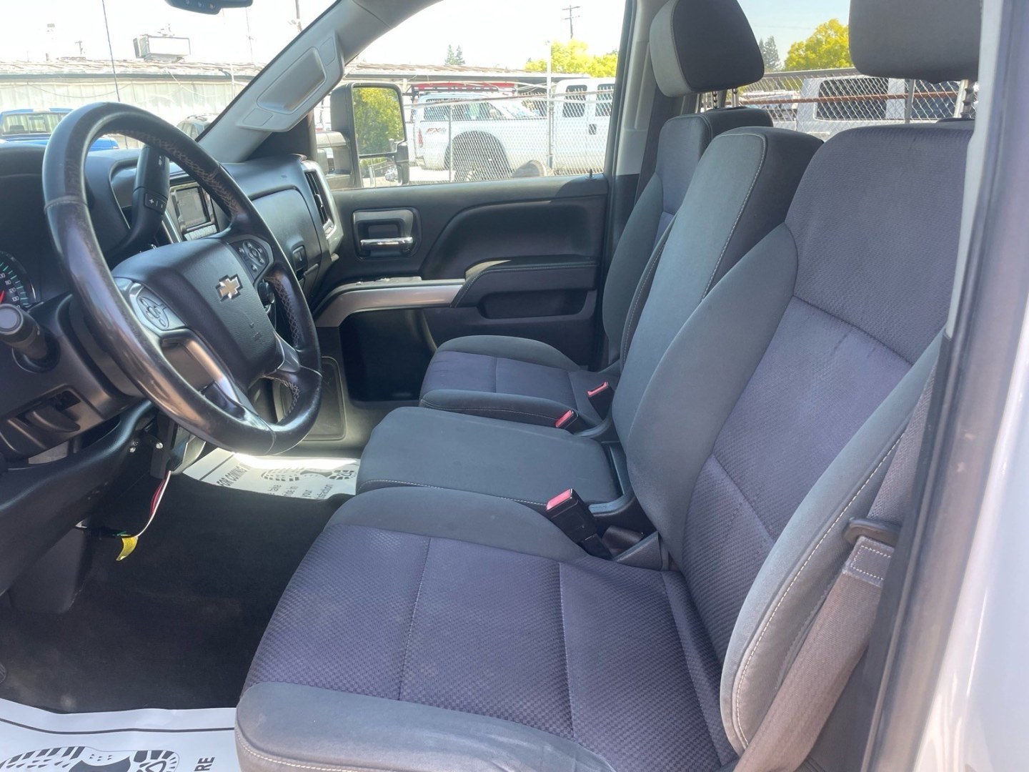2015 Summit White Chevrolet Silverado 3500HD LT (1GB4KZE82FF) with an 6.6L Duramax 6.6L Diesel Turbo V8 397hp 765ft. lbs. Common Rail Direct Injection engine, Allison 1000 6-Speed Shiftable Automatic transmission, located at 800 Riverside Ave, Roseville, CA, 95678, 916-773-4549 & Toll Free: 866-719-4393, 38.732265, -121.291039 - DURAMAX DIESEL CREW CAB 4X4 LT UTILITY BED ALLISON TRANSMISSION ARB BUMPER WARN WINCH- Photo#12