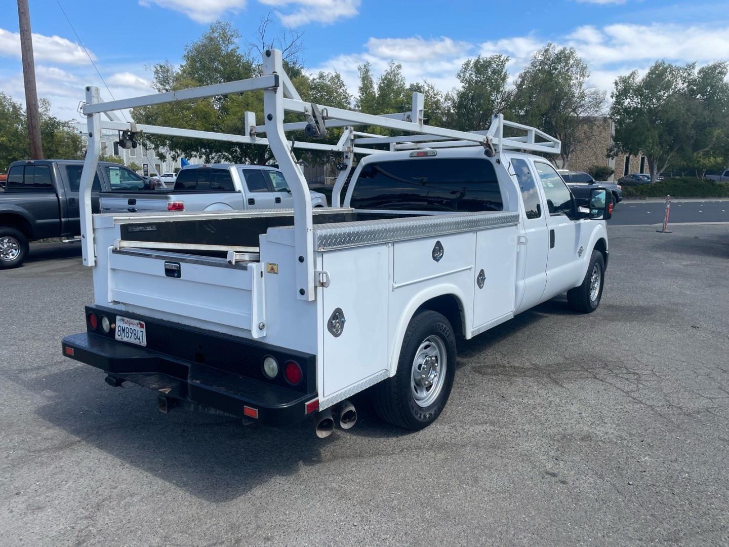 2015 Oxford White Ford F-250 Super Duty XL (1FD7X2AT7FE) with an 6.7L Power Stroke 6.7L Biodiesel Turbo V8 440hp 860ft. lbs. Common Rail Direct Injection engine, 6-Speed Shiftable Automatic transmission, located at 800 Riverside Ave, Roseville, CA, 95678, 916-773-4549 & Toll Free: 866-719-4393, 38.732265, -121.291039 - DIESEL SUPER CAB UTILITY BED CLEAN CARFAX- Photo#3