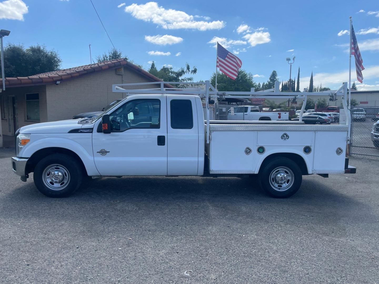 2015 Oxford White Ford F-250 Super Duty XL (1FD7X2AT7FE) with an 6.7L Power Stroke 6.7L Biodiesel Turbo V8 440hp 860ft. lbs. Common Rail Direct Injection engine, 6-Speed Shiftable Automatic transmission, located at 800 Riverside Ave, Roseville, CA, 95678, 916-773-4549 & Toll Free: 866-719-4393, 38.732265, -121.291039 - DIESEL SUPER CAB UTILITY BED CLEAN CARFAX- Photo#4