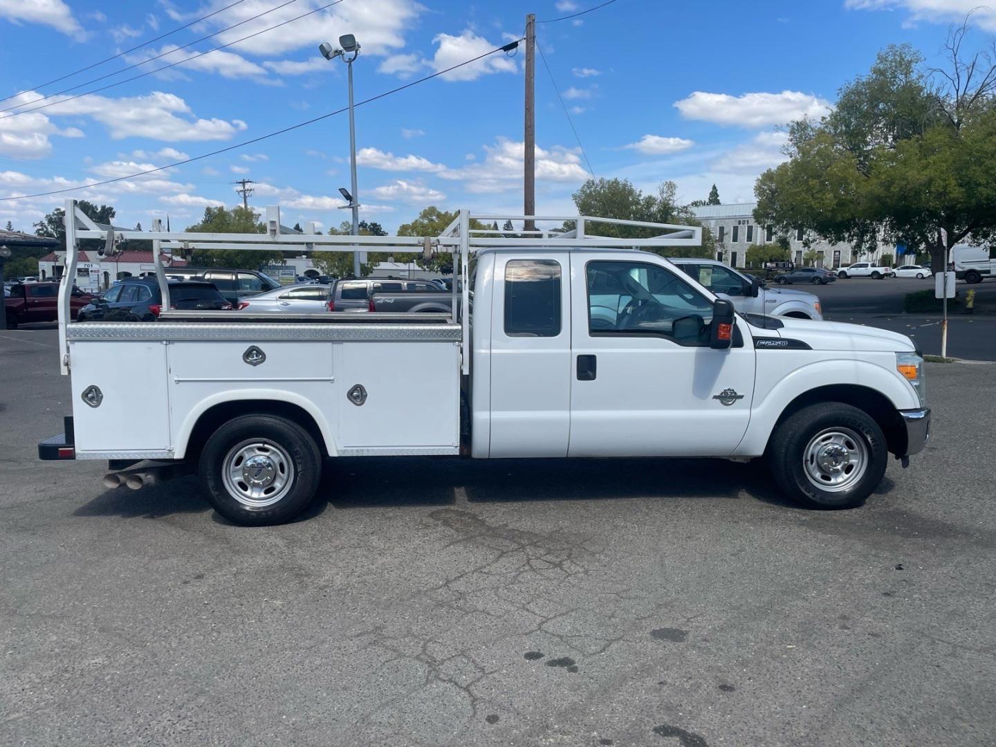 2015 Oxford White Ford F-250 Super Duty XL (1FD7X2AT7FE) with an 6.7L Power Stroke 6.7L Biodiesel Turbo V8 440hp 860ft. lbs. Common Rail Direct Injection engine, 6-Speed Shiftable Automatic transmission, located at 800 Riverside Ave, Roseville, CA, 95678, 916-773-4549 & Toll Free: 866-719-4393, 38.732265, -121.291039 - DIESEL SUPER CAB UTILITY BED CLEAN CARFAX- Photo#5