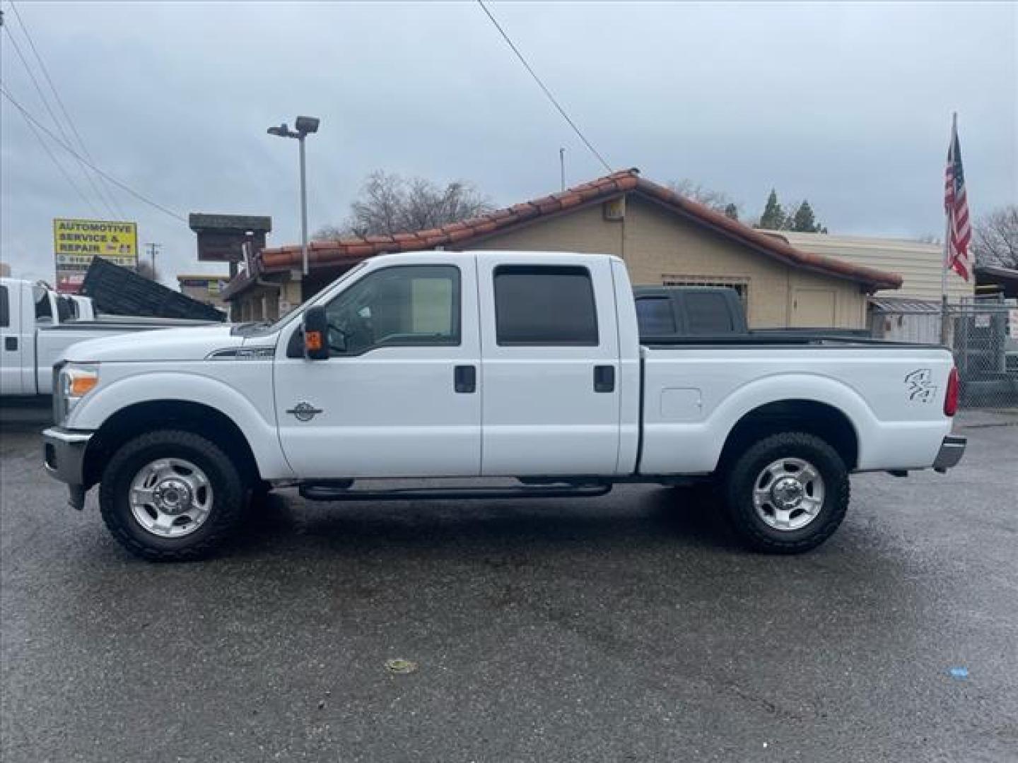2015 Oxford White Ford F-250 Super Duty XLT (1FT7W2BTXFE) with an 6.7L Power Stroke 6.7L Biodiesel Turbo V8 440hp 860ft. lbs. Common Rail Direct Injection engine, 6-Speed Shiftable Automatic transmission, located at 800 Riverside Ave, Roseville, CA, 95678, 916-773-4549 & Toll Free: 866-719-4393, 38.732265, -121.291039 - DIESEL CREW CAB 4X4 XLT SERVICE RECORDS ON CLEAN CARFAX - Photo#4