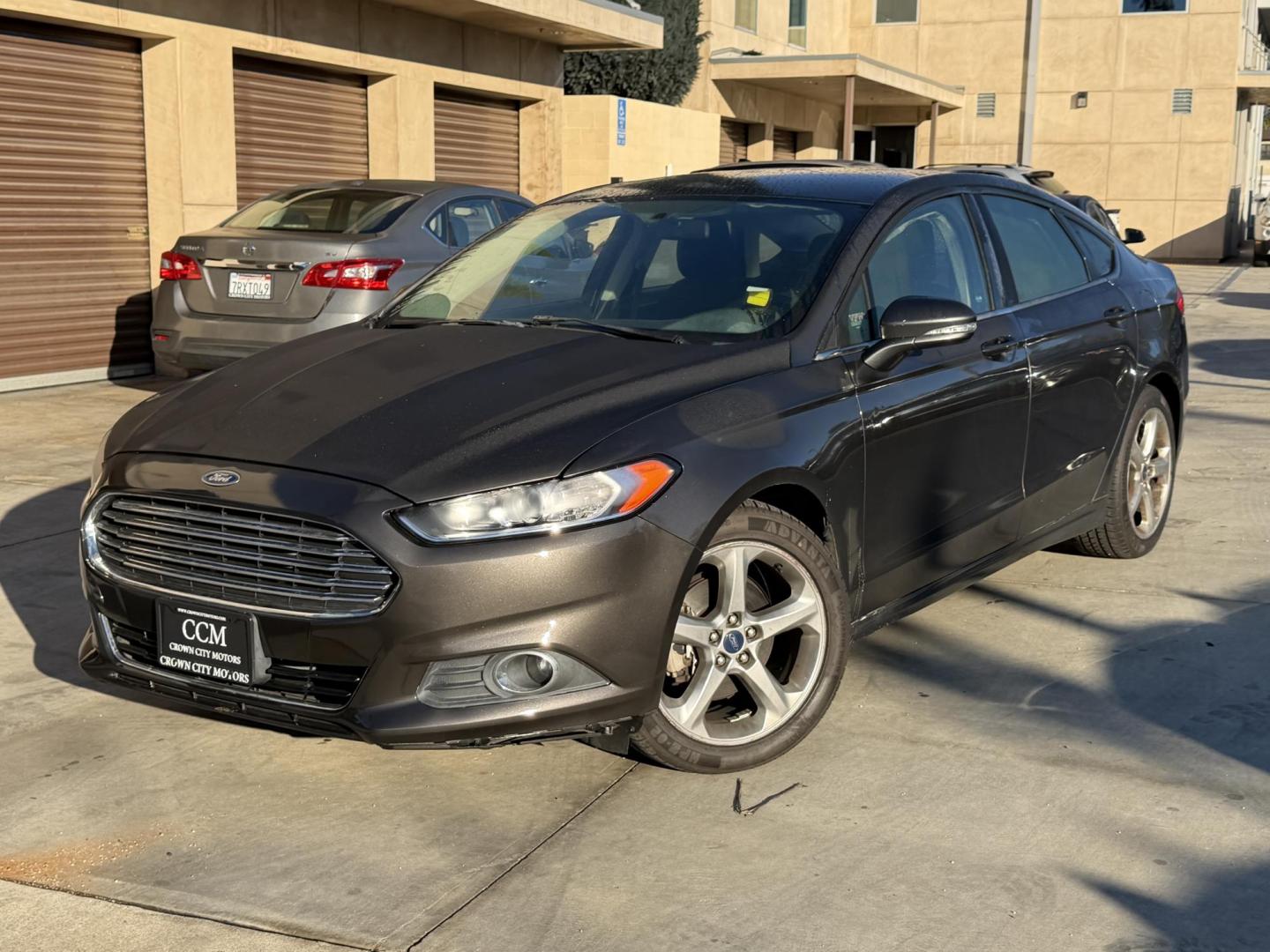 2015 /BLACK Ford Fusion SE (3FA6P0H75FR) with an 2.5L L4 DOHC 16V engine, located at 30 S. Berkeley Avenue, Pasadena, CA, 91107, (626) 248-7567, 34.145447, -118.109398 - Crown City Motors is a used “Buy Here Pay Here” car dealer in Pasadena CA. “Buy Here Pay Here” financing, means that when you purchase your vehicle from our dealership, that you make the payments to the dealership as well. We do not need the banks approval to get you approved for a used auto - Photo#0