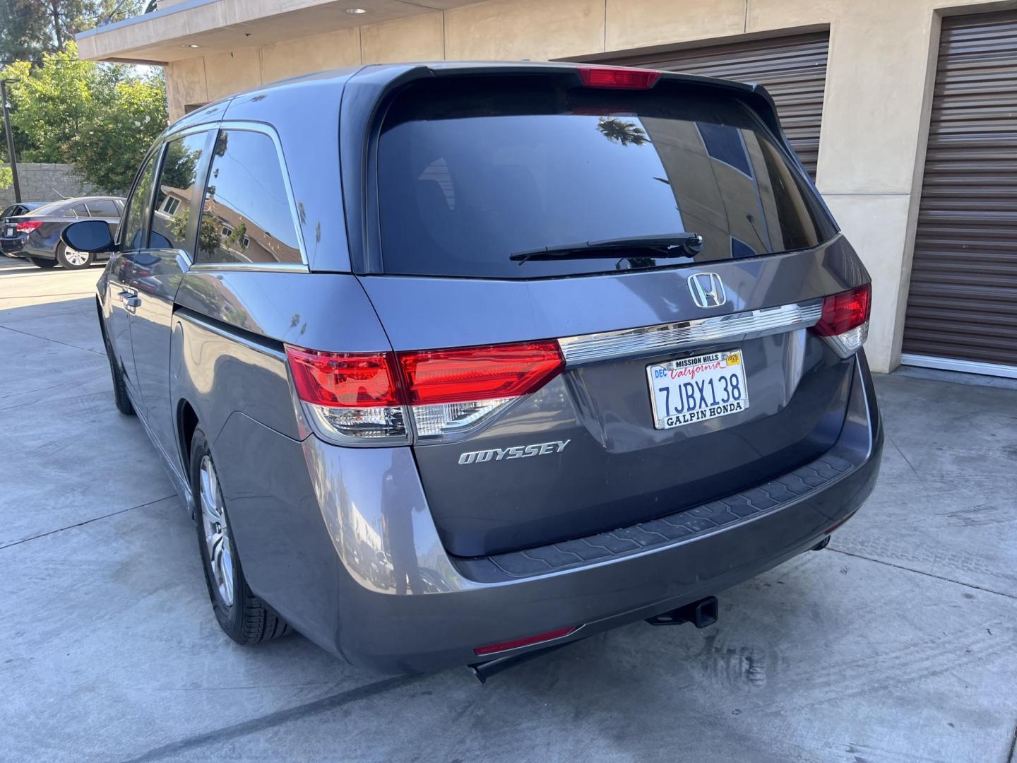2015 Smoky Topaz Metallic /Gray Honda Odyssey EX-L (5FNRL5H63FB) with an 3.5L V6 SOHC 24V engine, 6-Speed Automatic transmission, located at 30 S. Berkeley Avenue, Pasadena, CA, 91107, (626) 248-7567, 34.145447, -118.109398 - 2015 Honda Odyssey EX-L – Buy Here Pay Here Minivan in Pasadena | $500 Down | No Credit Check | Family-Ready Looking for the perfect family vehicle with room, comfort, and reliability — even if you have bad credit or no credit? Crown City Motors in Pasadena has exactly what you need with this - Photo#1