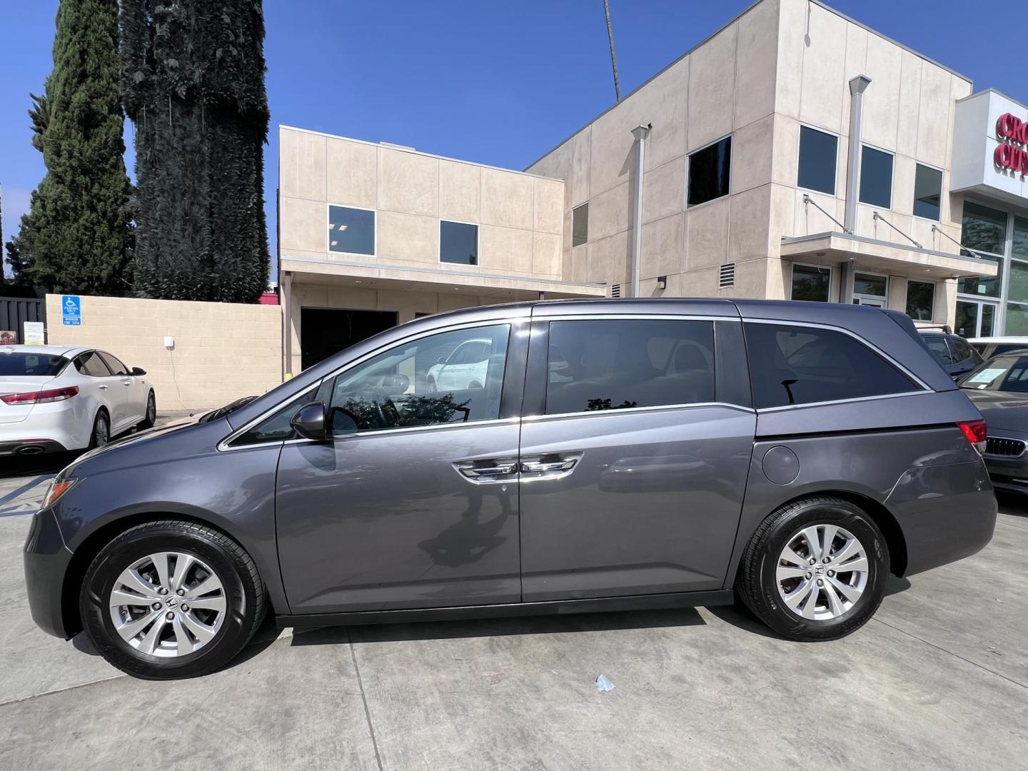 2015 Smoky Topaz Metallic /Gray Honda Odyssey EX-L (5FNRL5H63FB) with an 3.5L V6 SOHC 24V engine, 6-Speed Automatic transmission, located at 30 S. Berkeley Avenue, Pasadena, CA, 91107, (626) 248-7567, 34.145447, -118.109398 - 2015 Honda Odyssey EX-L – Buy Here Pay Here Minivan in Pasadena | $500 Down | No Credit Check | Family-Ready Looking for the perfect family vehicle with room, comfort, and reliability — even if you have bad credit or no credit? Crown City Motors in Pasadena has exactly what you need with this - Photo#5