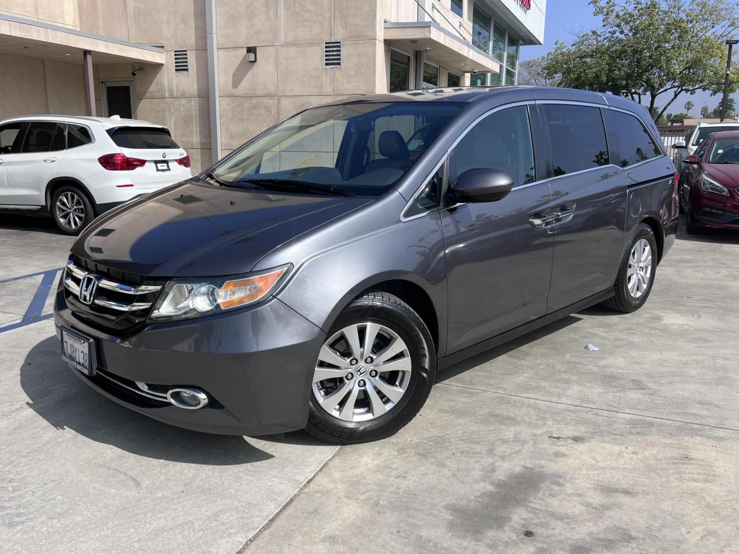 2015 Smoky Topaz Metallic /Gray Honda Odyssey EX-L (5FNRL5H63FB) with an 3.5L V6 SOHC 24V engine, 6-Speed Automatic transmission, located at 30 S. Berkeley Avenue, Pasadena, CA, 91107, (626) 248-7567, 34.145447, -118.109398 - 2015 Honda Odyssey EX-L – Buy Here Pay Here Minivan in Pasadena | $500 Down | No Credit Check | Family-Ready Looking for the perfect family vehicle with room, comfort, and reliability — even if you have bad credit or no credit? Crown City Motors in Pasadena has exactly what you need with this - Photo#4