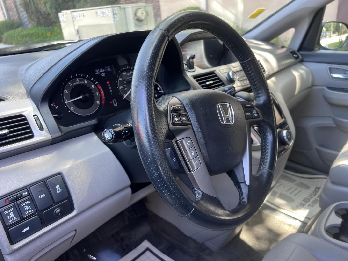 2015 Smoky Topaz Metallic /Gray Honda Odyssey EX-L (5FNRL5H63FB) with an 3.5L V6 SOHC 24V engine, 6-Speed Automatic transmission, located at 30 S. Berkeley Avenue, Pasadena, CA, 91107, (626) 248-7567, 34.145447, -118.109398 - 2015 Honda Odyssey EX-L – Buy Here Pay Here Minivan in Pasadena | $500 Down | No Credit Check | Family-Ready Looking for the perfect family vehicle with room, comfort, and reliability — even if you have bad credit or no credit? Crown City Motors in Pasadena has exactly what you need with this - Photo#12