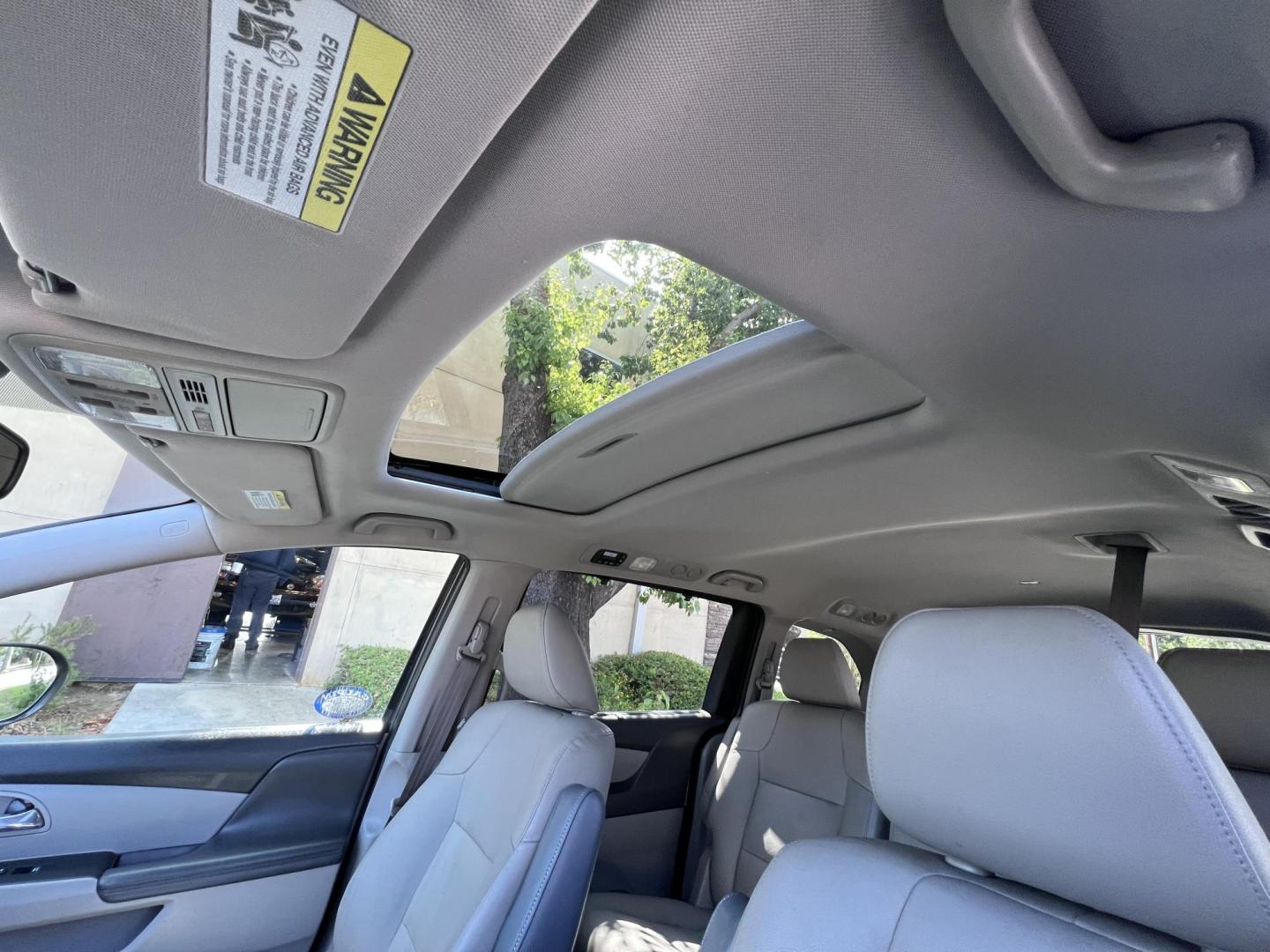 2015 Smoky Topaz Metallic /Gray Honda Odyssey EX-L (5FNRL5H63FB) with an 3.5L V6 SOHC 24V engine, 6-Speed Automatic transmission, located at 30 S. Berkeley Avenue, Pasadena, CA, 91107, (626) 248-7567, 34.145447, -118.109398 - 2015 Honda Odyssey EX-L – Buy Here Pay Here Minivan in Pasadena | $500 Down | No Credit Check | Family-Ready Looking for the perfect family vehicle with room, comfort, and reliability — even if you have bad credit or no credit? Crown City Motors in Pasadena has exactly what you need with this - Photo#11
