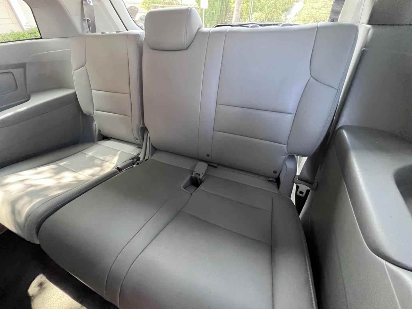 2015 Smoky Topaz Metallic /Gray Honda Odyssey EX-L (5FNRL5H63FB) with an 3.5L V6 SOHC 24V engine, 6-Speed Automatic transmission, located at 30 S. Berkeley Avenue, Pasadena, CA, 91107, (626) 248-7567, 34.145447, -118.109398 - 2015 Honda Odyssey EX-L – Buy Here Pay Here Minivan in Pasadena | $500 Down | No Credit Check | Family-Ready Looking for the perfect family vehicle with room, comfort, and reliability — even if you have bad credit or no credit? Crown City Motors in Pasadena has exactly what you need with this - Photo#18
