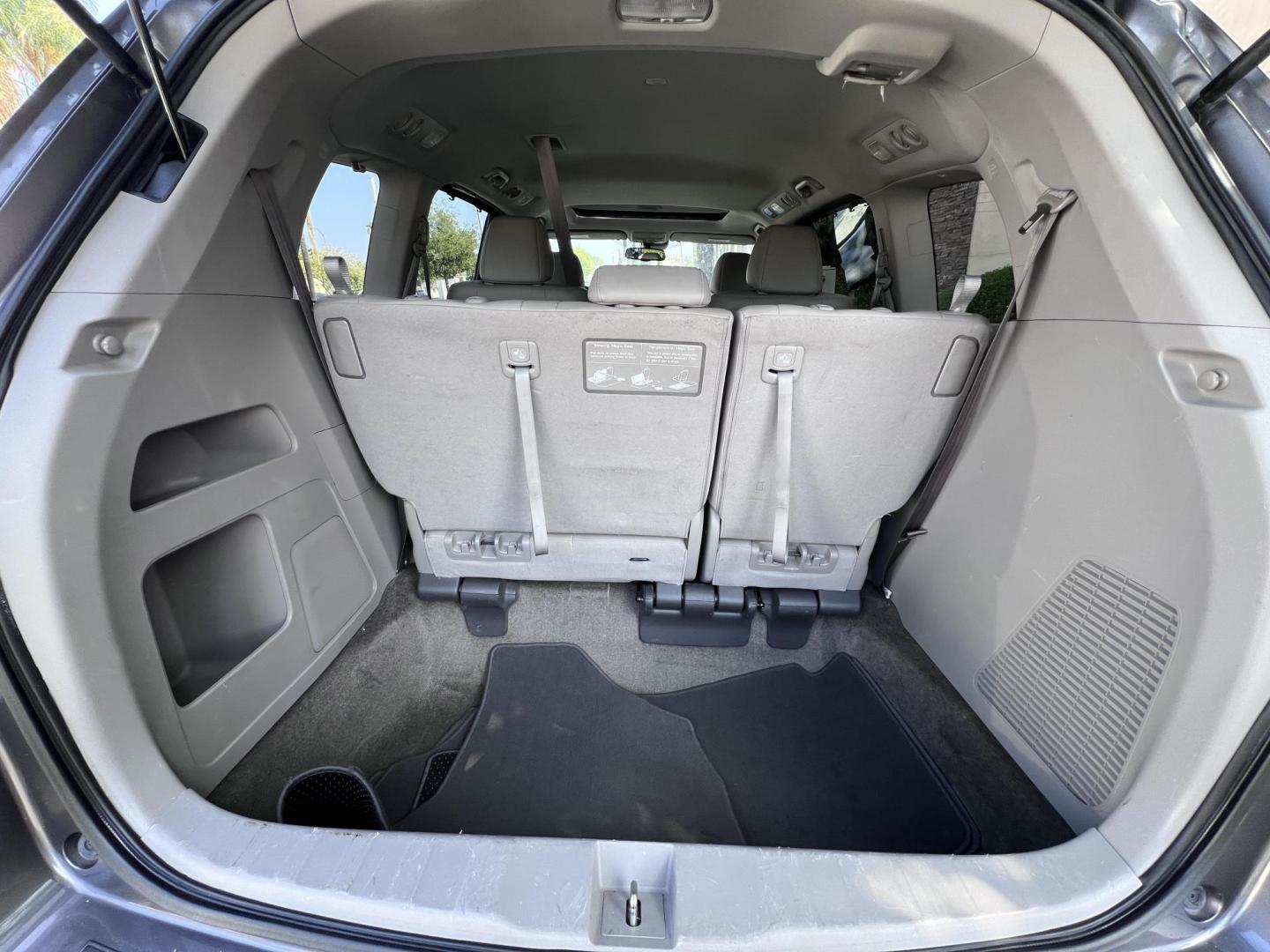2015 Smoky Topaz Metallic /Gray Honda Odyssey EX-L (5FNRL5H63FB) with an 3.5L V6 SOHC 24V engine, 6-Speed Automatic transmission, located at 30 S. Berkeley Avenue, Pasadena, CA, 91107, (626) 248-7567, 34.145447, -118.109398 - 2015 Honda Odyssey EX-L – Buy Here Pay Here Minivan in Pasadena | $500 Down | No Credit Check | Family-Ready Looking for the perfect family vehicle with room, comfort, and reliability — even if you have bad credit or no credit? Crown City Motors in Pasadena has exactly what you need with this - Photo#17