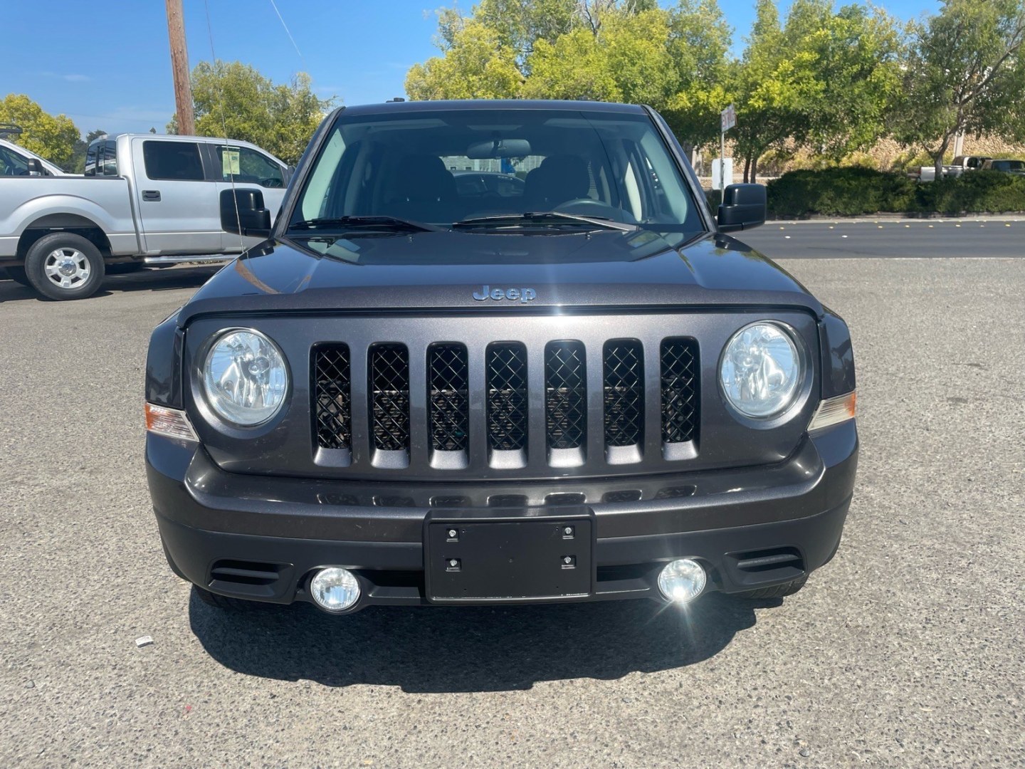 2015 Billet Silver Metallic Clear Coat Jeep Patriot Sport (1C4NJPBB5FD) with an 2.4L 2.4L I4 172hp 165ft. lbs. Sequential Multiport Fuel Injection engine, 5-Speed Manual transmission, located at 800 Riverside Ave, Roseville, CA, 95678, 916-773-4549 & Toll Free: 866-719-4393, 38.732265, -121.291039 - SPORT LOW MILES MANUAL TRANSMISSION- Photo#7