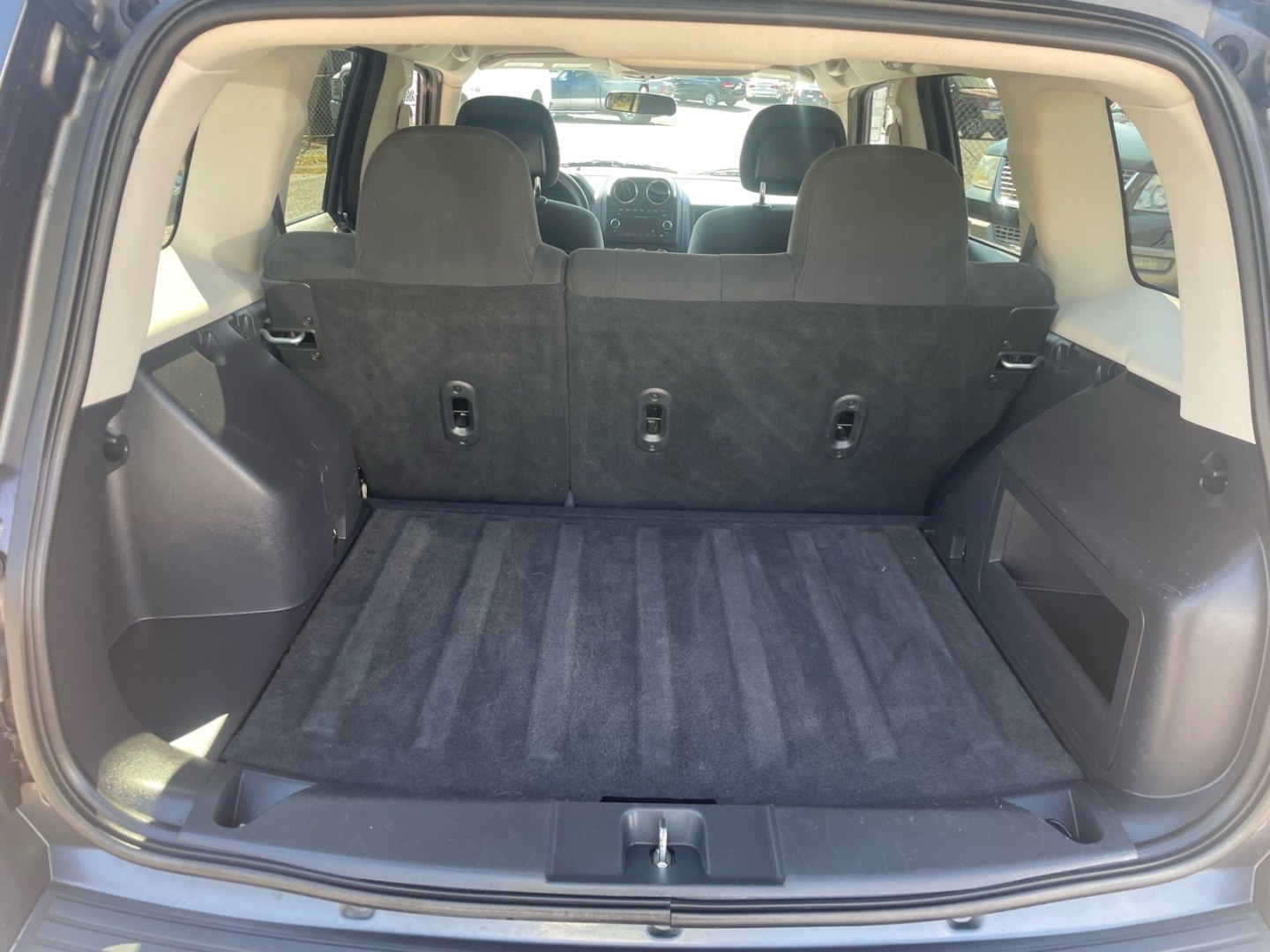 2015 Billet Silver Metallic Clear Coat Jeep Patriot Sport (1C4NJPBB5FD) with an 2.4L 2.4L I4 172hp 165ft. lbs. Sequential Multiport Fuel Injection engine, 5-Speed Manual transmission, located at 800 Riverside Ave, Roseville, CA, 95678, 916-773-4549 & Toll Free: 866-719-4393, 38.732265, -121.291039 - SPORT LOW MILES MANUAL TRANSMISSION- Photo#10