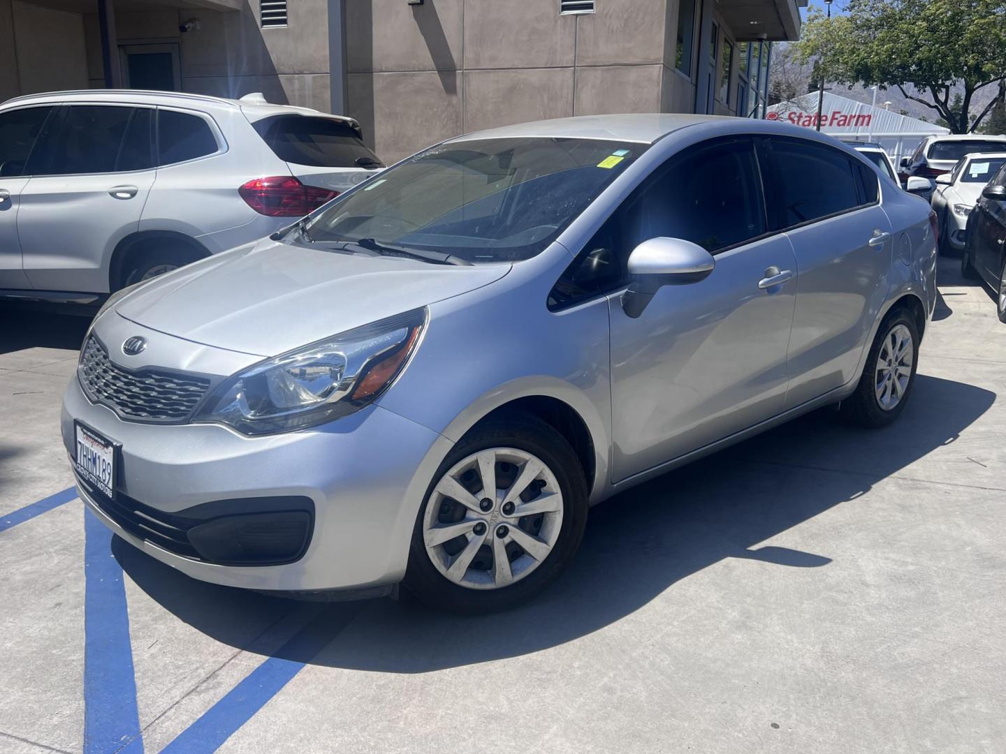 2015 Silver Metallic /Black Kia Rio LX (KNADM4A33F6) with an 1.6L L4 DOHC 16V engine, Maual transmission, located at 30 S. Berkeley Avenue, Pasadena, CA, 91107, (626) 248-7567, 34.145447, -118.109398 - 2015 Kia Rio LX – Fuel-Efficient Compact Sedan – $995 Down – Buy Here Pay Here – Bad Credit OK – Crown City Motors – Pasadena, CA Looking for a clean, fuel-efficient, and affordable sedan that gets you from point A to B with style and reliability? This 2015 Kia Rio LX is the perfect d - Photo#0