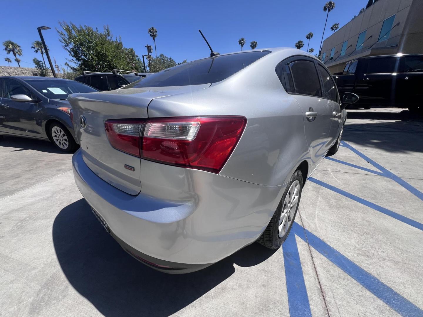 2015 Silver Metallic /Black Kia Rio LX (KNADM4A33F6) with an 1.6L L4 DOHC 16V engine, Maual transmission, located at 30 S. Berkeley Avenue, Pasadena, CA, 91107, (626) 248-7567, 34.145447, -118.109398 - 2015 Kia Rio LX – Fuel-Efficient Compact Sedan – $995 Down – Buy Here Pay Here – Bad Credit OK – Crown City Motors – Pasadena, CA Looking for a clean, fuel-efficient, and affordable sedan that gets you from point A to B with style and reliability? This 2015 Kia Rio LX is the perfect d - Photo#4