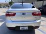 2015 Silver Metallic /Black Kia Rio LX (KNADM4A33F6) with an 1.6L L4 DOHC 16V engine, Maual transmission, located at 30 S. Berkeley Avenue, Pasadena, CA, 91107, (626) 248-7567, 34.145447, -118.109398 - 2015 Kia Rio LX – Fuel-Efficient Compact Sedan – $995 Down – Buy Here Pay Here – Bad Credit OK – Crown City Motors – Pasadena, CA Looking for a clean, fuel-efficient, and affordable sedan that gets you from point A to B with style and reliability? This 2015 Kia Rio LX is the perfect d - Photo#10