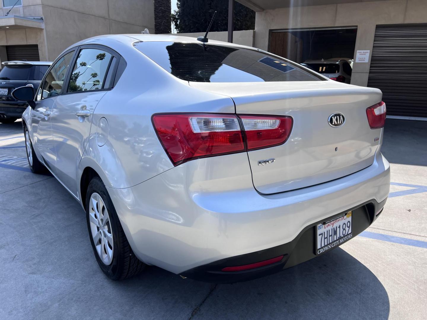 2015 Silver Metallic /Black Kia Rio LX (KNADM4A33F6) with an 1.6L L4 DOHC 16V engine, Maual transmission, located at 30 S. Berkeley Avenue, Pasadena, CA, 91107, (626) 248-7567, 34.145447, -118.109398 - 2015 Kia Rio LX – Fuel-Efficient Compact Sedan – $995 Down – Buy Here Pay Here – Bad Credit OK – Crown City Motors – Pasadena, CA Looking for a clean, fuel-efficient, and affordable sedan that gets you from point A to B with style and reliability? This 2015 Kia Rio LX is the perfect d - Photo#11