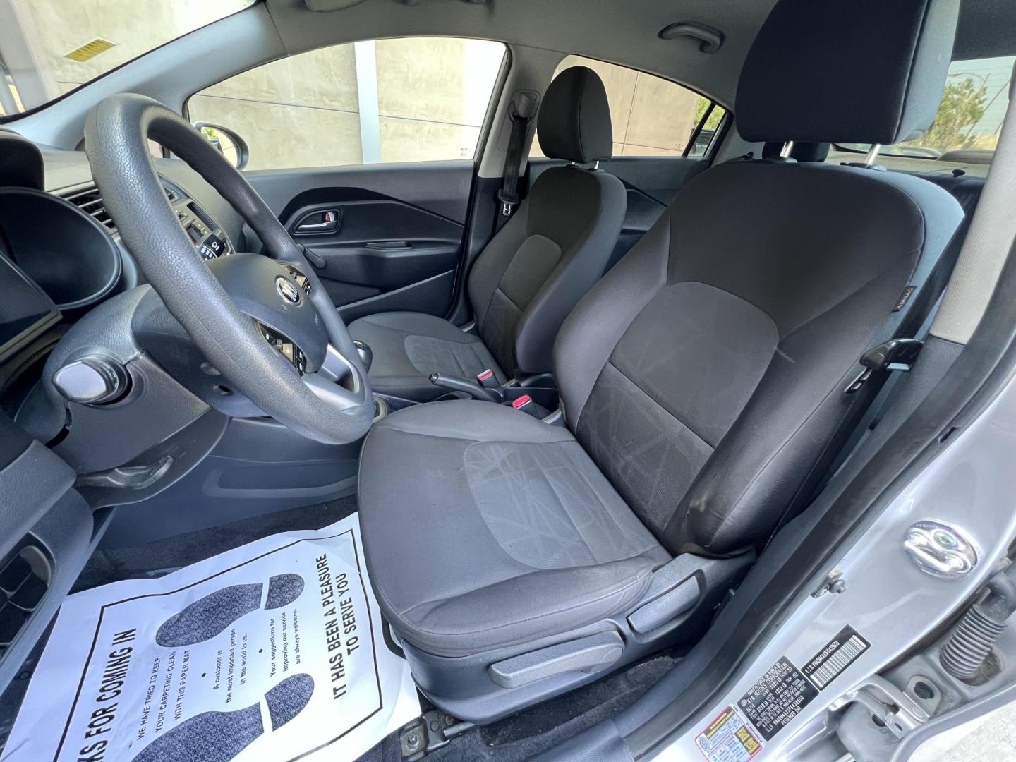 2015 Silver Metallic /Black Kia Rio LX (KNADM4A33F6) with an 1.6L L4 DOHC 16V engine, Maual transmission, located at 30 S. Berkeley Avenue, Pasadena, CA, 91107, (626) 248-7567, 34.145447, -118.109398 - 2015 Kia Rio LX – Fuel-Efficient Compact Sedan – $995 Down – Buy Here Pay Here – Bad Credit OK – Crown City Motors – Pasadena, CA Looking for a clean, fuel-efficient, and affordable sedan that gets you from point A to B with style and reliability? This 2015 Kia Rio LX is the perfect d - Photo#14