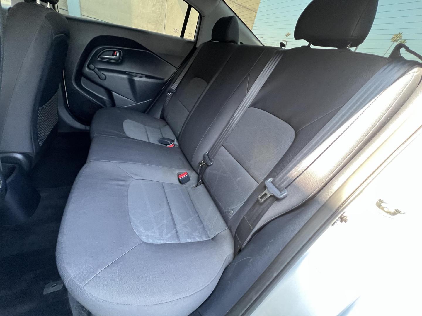 2015 Silver Metallic /Black Kia Rio LX (KNADM4A33F6) with an 1.6L L4 DOHC 16V engine, Maual transmission, located at 30 S. Berkeley Avenue, Pasadena, CA, 91107, (626) 248-7567, 34.145447, -118.109398 - 2015 Kia Rio LX – Fuel-Efficient Compact Sedan – $995 Down – Buy Here Pay Here – Bad Credit OK – Crown City Motors – Pasadena, CA Looking for a clean, fuel-efficient, and affordable sedan that gets you from point A to B with style and reliability? This 2015 Kia Rio LX is the perfect d - Photo#22