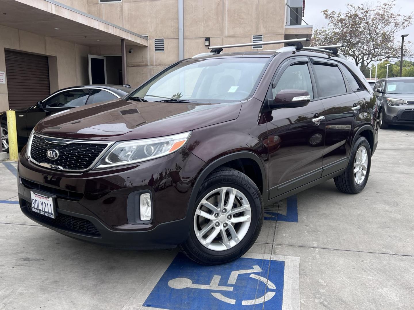 2015 Dark Cherry Pearl /Tan Kia Sorento LX 2WD (5XYKT3A69FG) with an 2.4L L4 DOHC 16V engine, 6-Speed Automatic transmission, located at 30 S. Berkeley Avenue, Pasadena, CA, 91107, (626) 248-7567, 34.145447, -118.109398 - 2015 Kia Sorento – Affordable, Reliable, and Stylish SUV in Pasadena, CA | Buy Here Pay Here Available Looking for a dependable and stylish SUV that won't break the bank? Crown City Motors in Pasadena, CA is proud to offer this 2015 Kia Sorento in a stunning burgundy finish (Dark Cherry Pearl / R - Photo#8