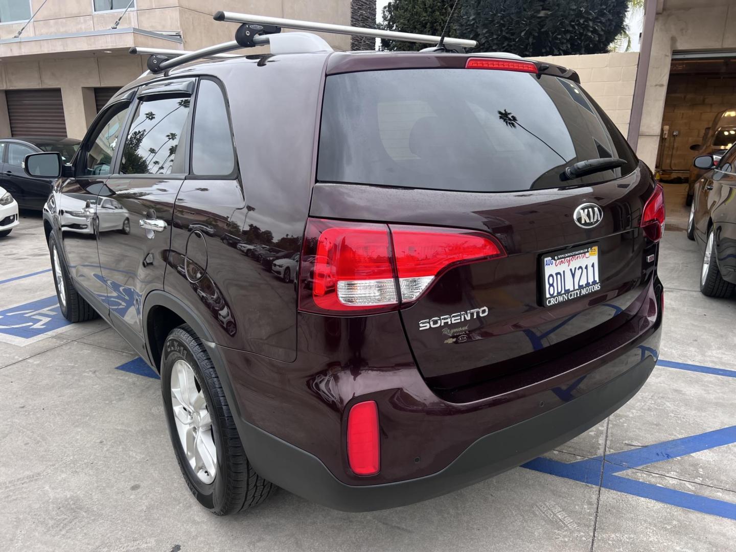 2015 Dark Cherry Pearl /Tan Kia Sorento LX 2WD (5XYKT3A69FG) with an 2.4L L4 DOHC 16V engine, 6-Speed Automatic transmission, located at 30 S. Berkeley Avenue, Pasadena, CA, 91107, (626) 248-7567, 34.145447, -118.109398 - 2015 Kia Sorento – Affordable, Reliable, and Stylish SUV in Pasadena, CA | Buy Here Pay Here Available Looking for a dependable and stylish SUV that won't break the bank? Crown City Motors in Pasadena, CA is proud to offer this 2015 Kia Sorento in a stunning burgundy finish (Dark Cherry Pearl / R - Photo#10