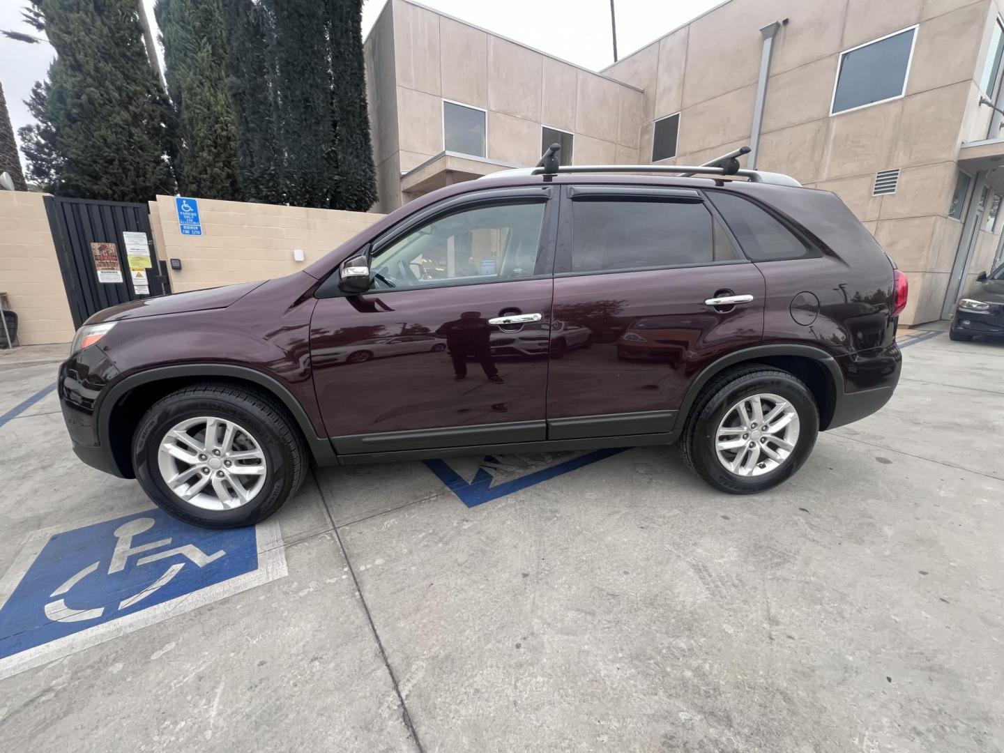 2015 Dark Cherry Pearl /Tan Kia Sorento LX 2WD (5XYKT3A69FG) with an 2.4L L4 DOHC 16V engine, 6-Speed Automatic transmission, located at 30 S. Berkeley Avenue, Pasadena, CA, 91107, (626) 248-7567, 34.145447, -118.109398 - 2015 Kia Sorento – Affordable, Reliable, and Stylish SUV in Pasadena, CA | Buy Here Pay Here Available Looking for a dependable and stylish SUV that won't break the bank? Crown City Motors in Pasadena, CA is proud to offer this 2015 Kia Sorento in a stunning burgundy finish (Dark Cherry Pearl / R - Photo#9
