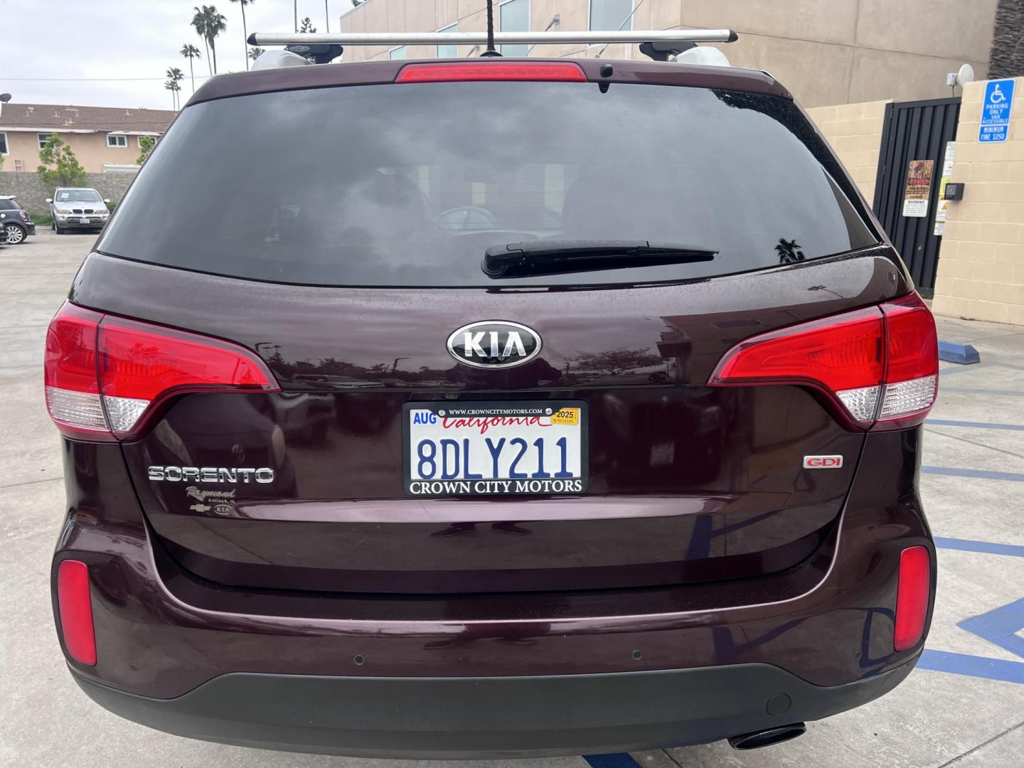 2015 Dark Cherry Pearl /Tan Kia Sorento LX 2WD (5XYKT3A69FG) with an 2.4L L4 DOHC 16V engine, 6-Speed Automatic transmission, located at 30 S. Berkeley Avenue, Pasadena, CA, 91107, (626) 248-7567, 34.145447, -118.109398 - 2015 Kia Sorento – Affordable, Reliable, and Stylish SUV in Pasadena, CA | Buy Here Pay Here Available Looking for a dependable and stylish SUV that won't break the bank? Crown City Motors in Pasadena, CA is proud to offer this 2015 Kia Sorento in a stunning burgundy finish (Dark Cherry Pearl / R - Photo#11