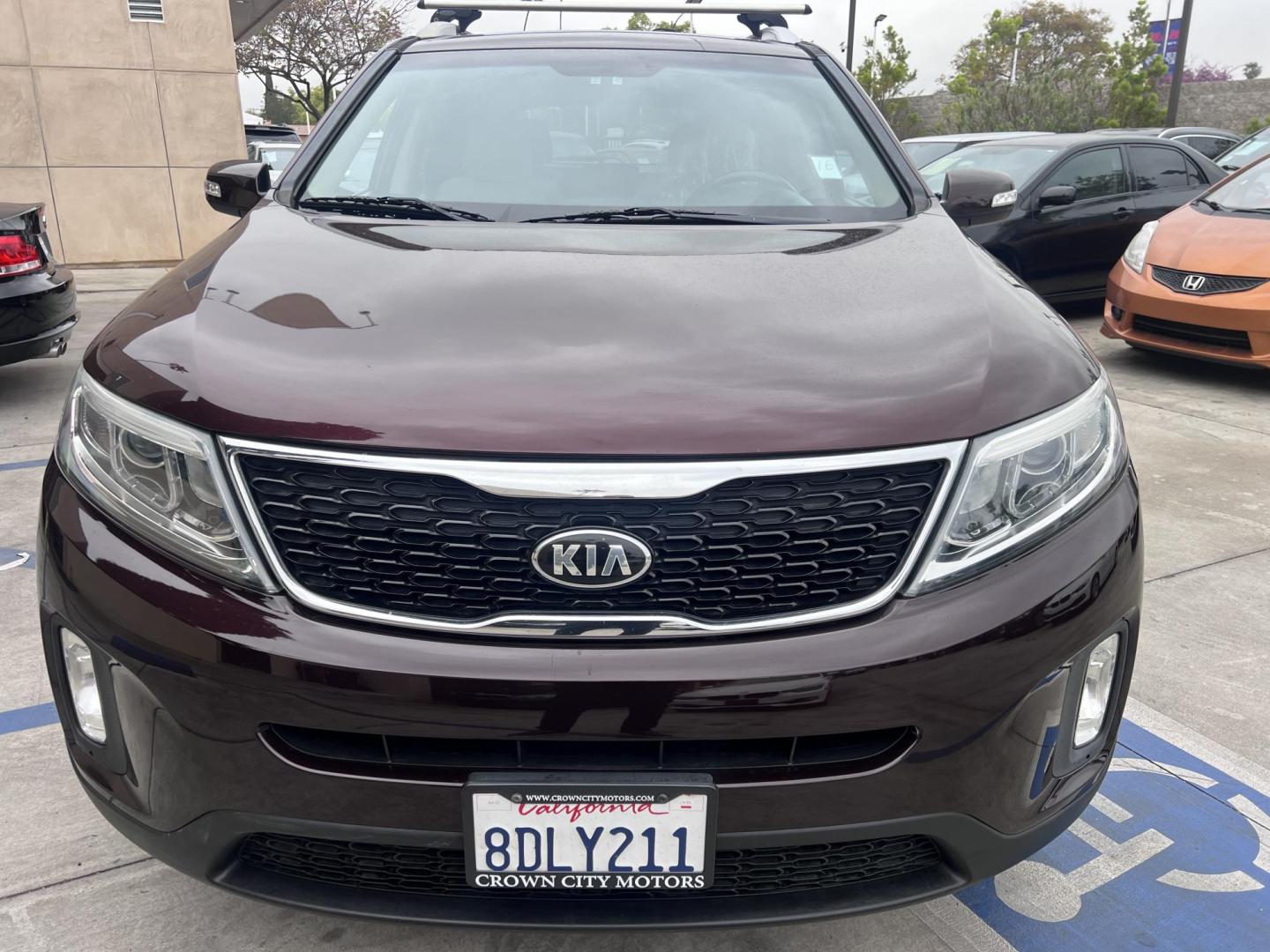 2015 Dark Cherry Pearl /Tan Kia Sorento LX 2WD (5XYKT3A69FG) with an 2.4L L4 DOHC 16V engine, 6-Speed Automatic transmission, located at 30 S. Berkeley Avenue, Pasadena, CA, 91107, (626) 248-7567, 34.145447, -118.109398 - 2015 Kia Sorento – Affordable, Reliable, and Stylish SUV in Pasadena, CA | Buy Here Pay Here Available Looking for a dependable and stylish SUV that won't break the bank? Crown City Motors in Pasadena, CA is proud to offer this 2015 Kia Sorento in a stunning burgundy finish (Dark Cherry Pearl / R - Photo#15