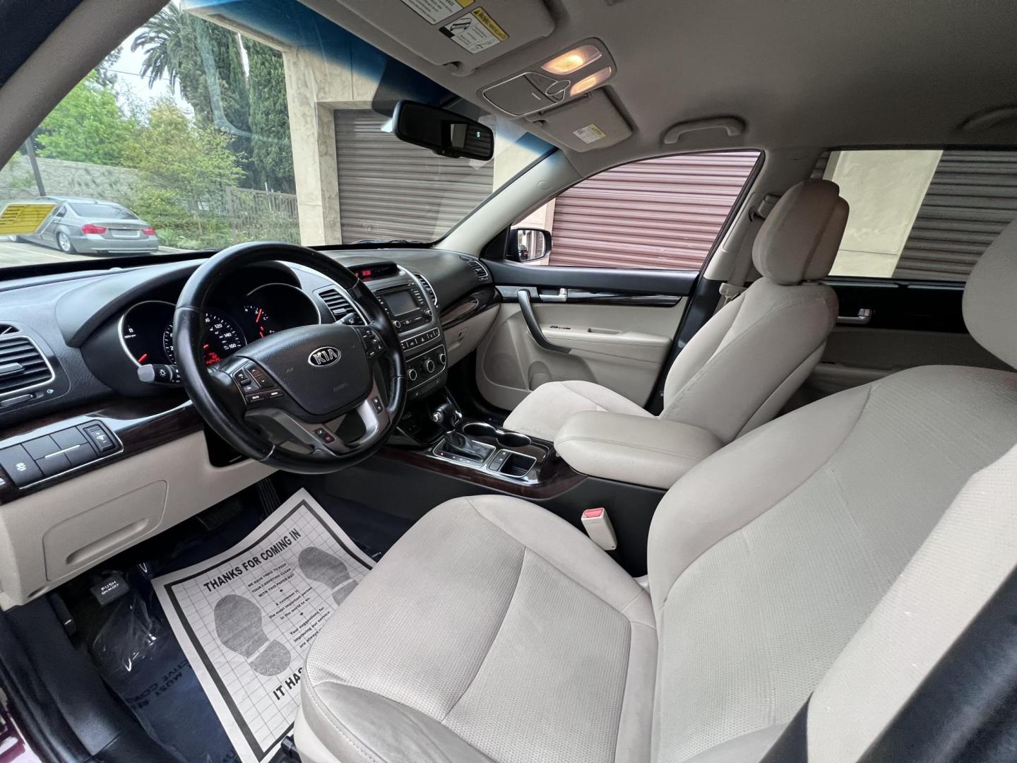 2015 Dark Cherry Pearl /Tan Kia Sorento LX 2WD (5XYKT3A69FG) with an 2.4L L4 DOHC 16V engine, 6-Speed Automatic transmission, located at 30 S. Berkeley Avenue, Pasadena, CA, 91107, (626) 248-7567, 34.145447, -118.109398 - 2015 Kia Sorento – Affordable, Reliable, and Stylish SUV in Pasadena, CA | Buy Here Pay Here Available Looking for a dependable and stylish SUV that won't break the bank? Crown City Motors in Pasadena, CA is proud to offer this 2015 Kia Sorento in a stunning burgundy finish (Dark Cherry Pearl / R - Photo#19
