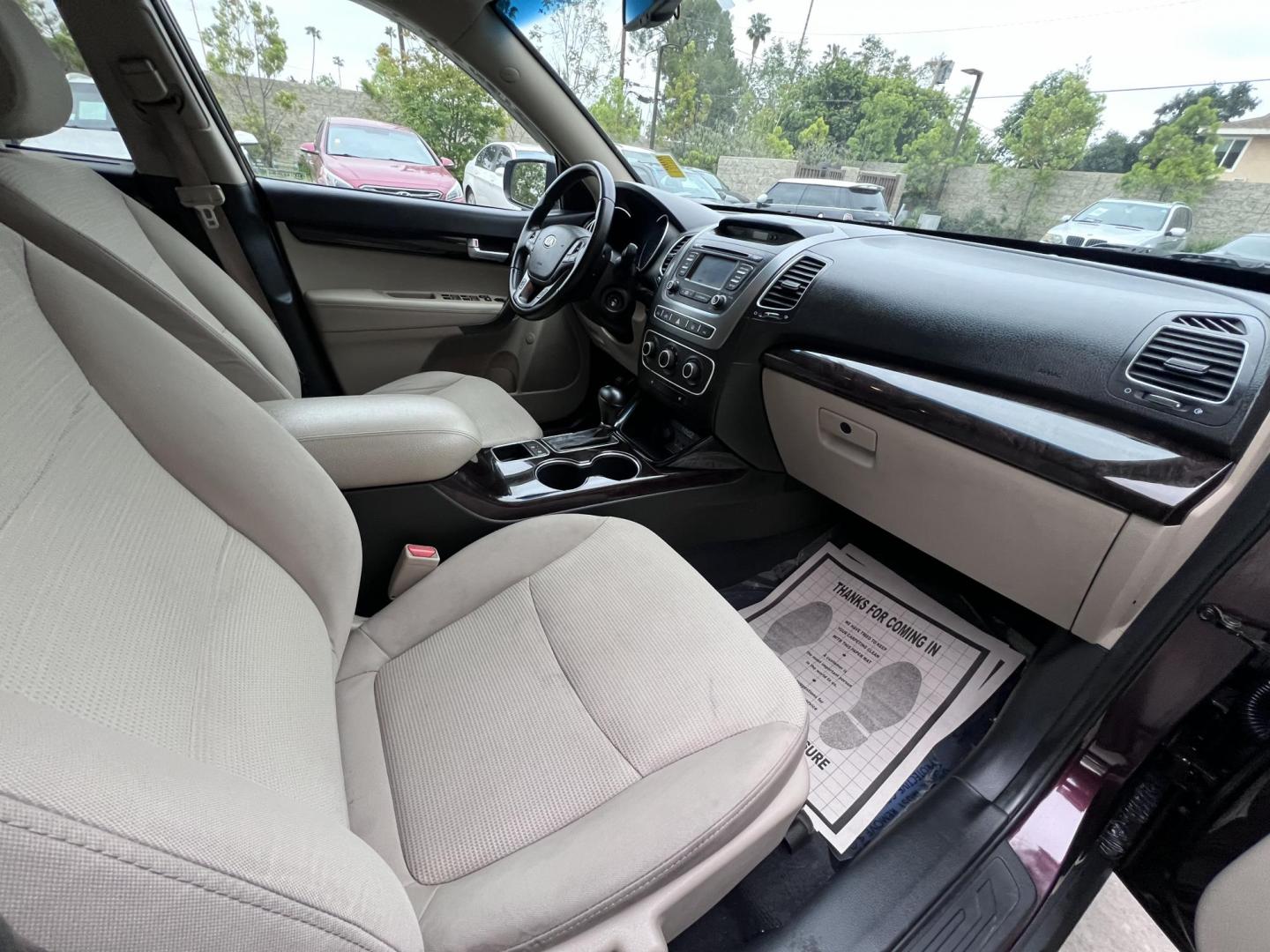 2015 Dark Cherry Pearl /Tan Kia Sorento LX 2WD (5XYKT3A69FG) with an 2.4L L4 DOHC 16V engine, 6-Speed Automatic transmission, located at 30 S. Berkeley Avenue, Pasadena, CA, 91107, (626) 248-7567, 34.145447, -118.109398 - 2015 Kia Sorento – Affordable, Reliable, and Stylish SUV in Pasadena, CA | Buy Here Pay Here Available Looking for a dependable and stylish SUV that won't break the bank? Crown City Motors in Pasadena, CA is proud to offer this 2015 Kia Sorento in a stunning burgundy finish (Dark Cherry Pearl / R - Photo#27