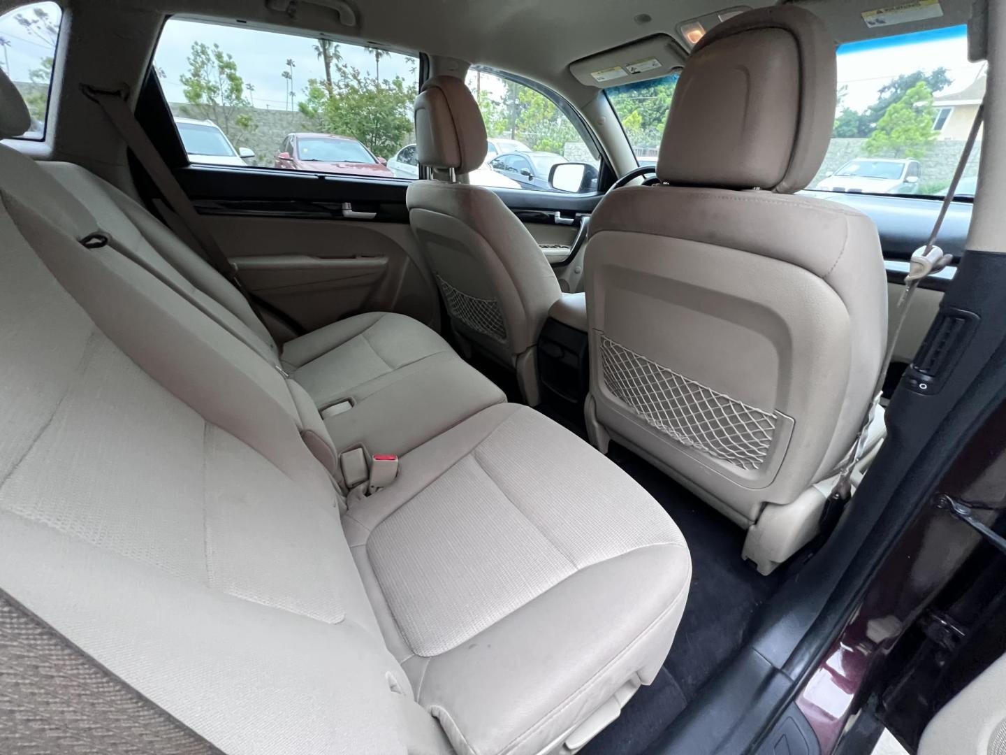 2015 Dark Cherry Pearl /Tan Kia Sorento LX 2WD (5XYKT3A69FG) with an 2.4L L4 DOHC 16V engine, 6-Speed Automatic transmission, located at 30 S. Berkeley Avenue, Pasadena, CA, 91107, (626) 248-7567, 34.145447, -118.109398 - 2015 Kia Sorento – Affordable, Reliable, and Stylish SUV in Pasadena, CA | Buy Here Pay Here Available Looking for a dependable and stylish SUV that won't break the bank? Crown City Motors in Pasadena, CA is proud to offer this 2015 Kia Sorento in a stunning burgundy finish (Dark Cherry Pearl / R - Photo#30