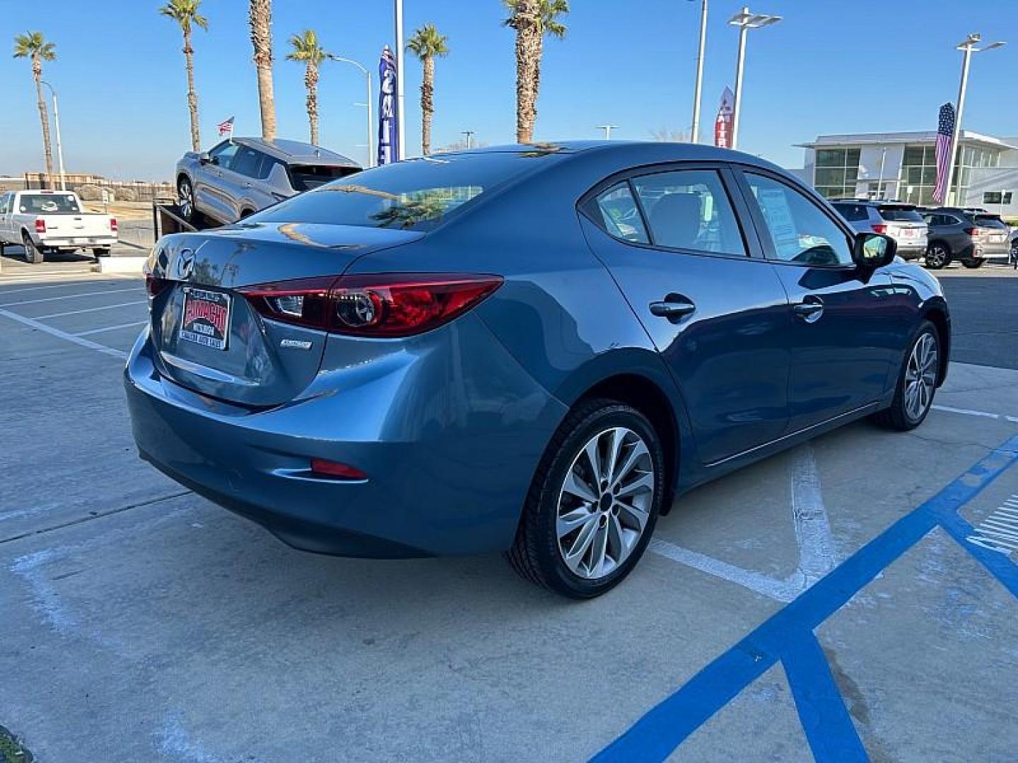 2015 BLUE Mazda Mazda3 (3MZBM1U71FM) with an 4-Cyl SKYACTIV-G 2.0L engine, Auto 6-Spd SKYACTIV-Drv transmission, located at 412 Auto Vista Drive, Palmdale, 93551, (661) 945-0620, 34.592636, -118.136681 - Photo#6