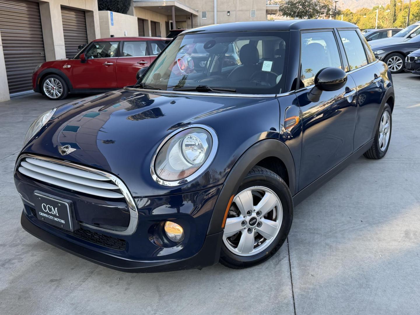 2015 Deep Blue Metallic /Black Mini Cooper Base (WMWXS5C50FT) with an 1.5L L3 engine, Automatic transmission, located at 30 S. Berkeley Avenue, Pasadena, CA, 91107, (626) 248-7567, 34.145447, -118.109398 - 2015 MINI Cooper Hardtop – Deep Blue Metallic | Style, Efficiency and Easy Financing in Pasadena Drive away in this stylish and fun-to-drive 2015 MINI Cooper Hardtop, finished in stunning Deep Blue Metallic with a black interior. Compact, sporty, and full of character, this MINI delivers worl- Photo#0
