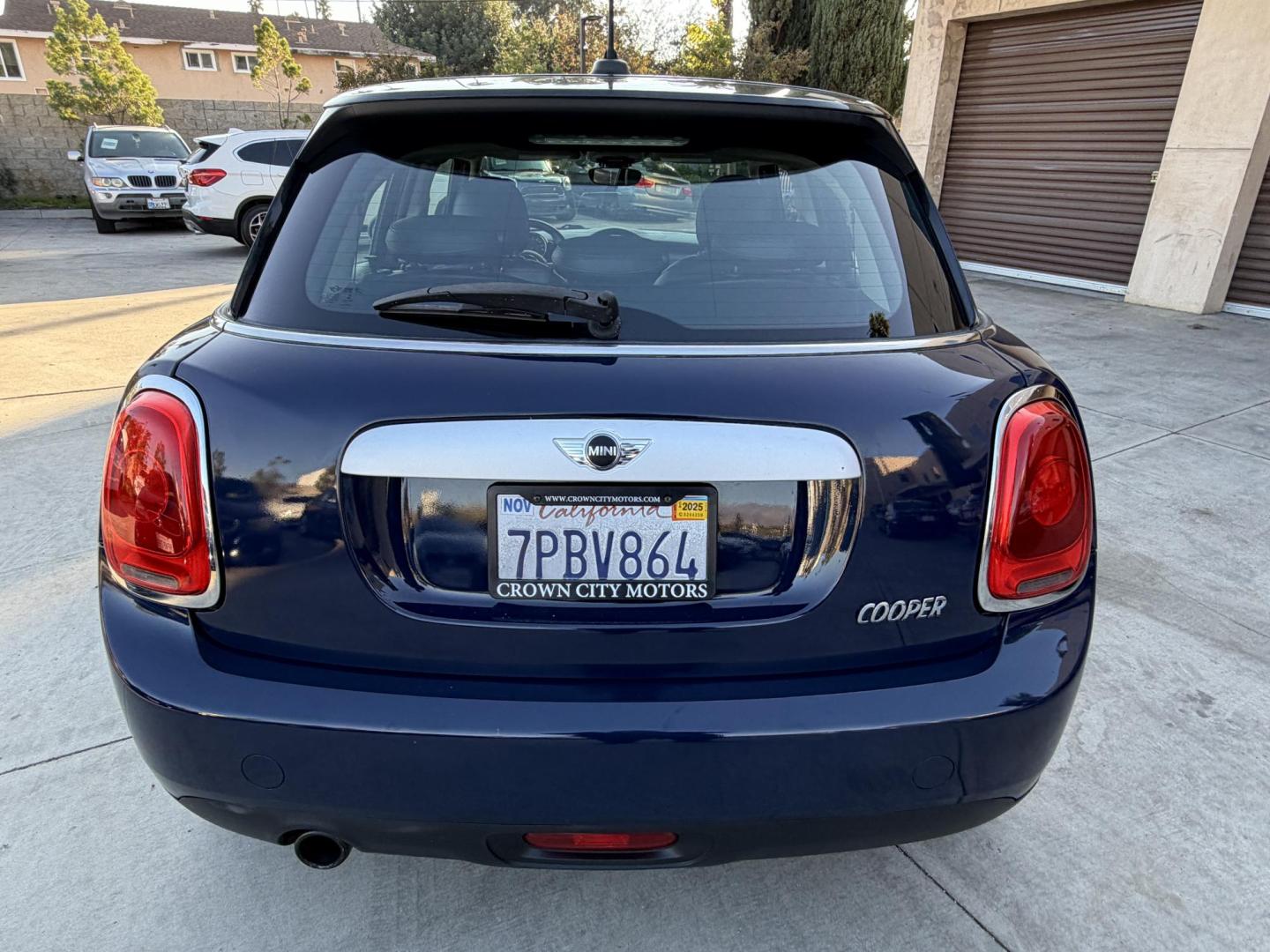 2015 Deep Blue Metallic /Black Mini Cooper Base (WMWXS5C50FT) with an 1.5L L3 engine, Automatic transmission, located at 30 S. Berkeley Avenue, Pasadena, CA, 91107, (626) 248-7567, 34.145447, -118.109398 - 2015 MINI Cooper Hardtop – Deep Blue Metallic | Style, Efficiency and Easy Financing in Pasadena Drive away in this stylish and fun-to-drive 2015 MINI Cooper Hardtop, finished in stunning Deep Blue Metallic with a black interior. Compact, sporty, and full of character, this MINI delivers worl- Photo#3