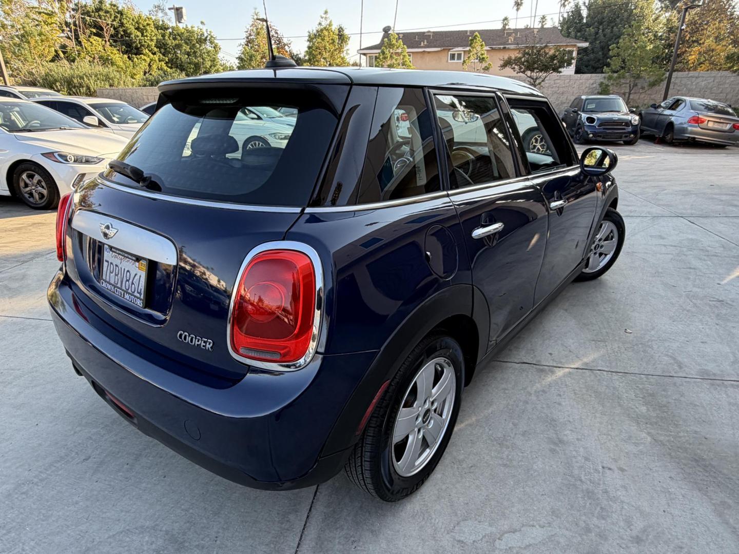 2015 Deep Blue Metallic /Black Mini Cooper Base (WMWXS5C50FT) with an 1.5L L3 engine, Automatic transmission, located at 30 S. Berkeley Avenue, Pasadena, CA, 91107, (626) 248-7567, 34.145447, -118.109398 - 2015 MINI Cooper Hardtop – Deep Blue Metallic | Style, Efficiency and Easy Financing in Pasadena Drive away in this stylish and fun-to-drive 2015 MINI Cooper Hardtop, finished in stunning Deep Blue Metallic with a black interior. Compact, sporty, and full of character, this MINI delivers worl- Photo#6