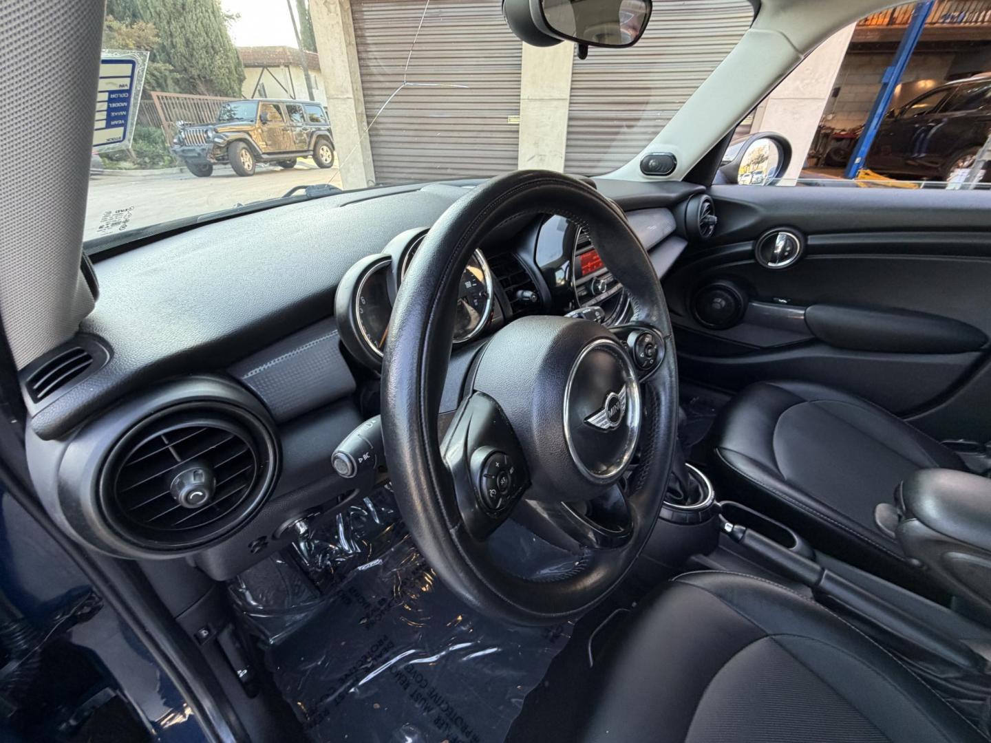 2015 Deep Blue Metallic /Black Mini Cooper Base (WMWXS5C50FT) with an 1.5L L3 engine, Automatic transmission, located at 30 S. Berkeley Avenue, Pasadena, CA, 91107, (626) 248-7567, 34.145447, -118.109398 - 2015 MINI Cooper Hardtop – Deep Blue Metallic | Style, Efficiency and Easy Financing in Pasadena Drive away in this stylish and fun-to-drive 2015 MINI Cooper Hardtop, finished in stunning Deep Blue Metallic with a black interior. Compact, sporty, and full of character, this MINI delivers worl- Photo#12