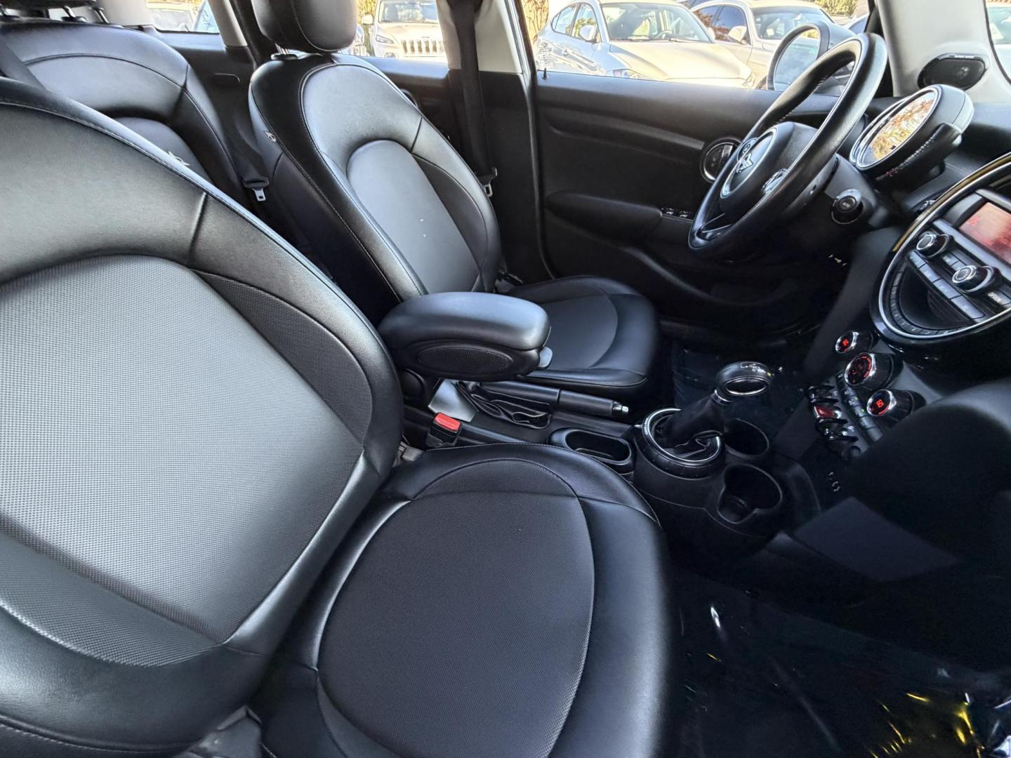 2015 Deep Blue Metallic /Black Mini Cooper Base (WMWXS5C50FT) with an 1.5L L3 engine, Automatic transmission, located at 30 S. Berkeley Avenue, Pasadena, CA, 91107, (626) 248-7567, 34.145447, -118.109398 - 2015 MINI Cooper Hardtop – Deep Blue Metallic | Style, Efficiency and Easy Financing in Pasadena Drive away in this stylish and fun-to-drive 2015 MINI Cooper Hardtop, finished in stunning Deep Blue Metallic with a black interior. Compact, sporty, and full of character, this MINI delivers worl- Photo#16