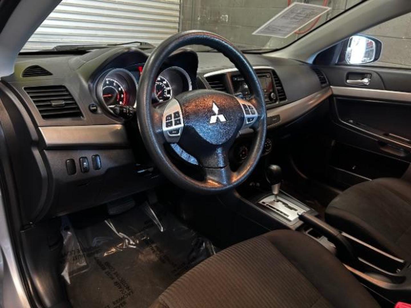 2015 Mitsubishi Lancer (JA32U2FU8FU) with an 4-Cyl 2.0 Liter engine, Automatic CVT transmission, located at 412 Auto Vista Drive, Palmdale, 93551, (661) 945-0620, 34.592636, -118.136681 - Photo#10