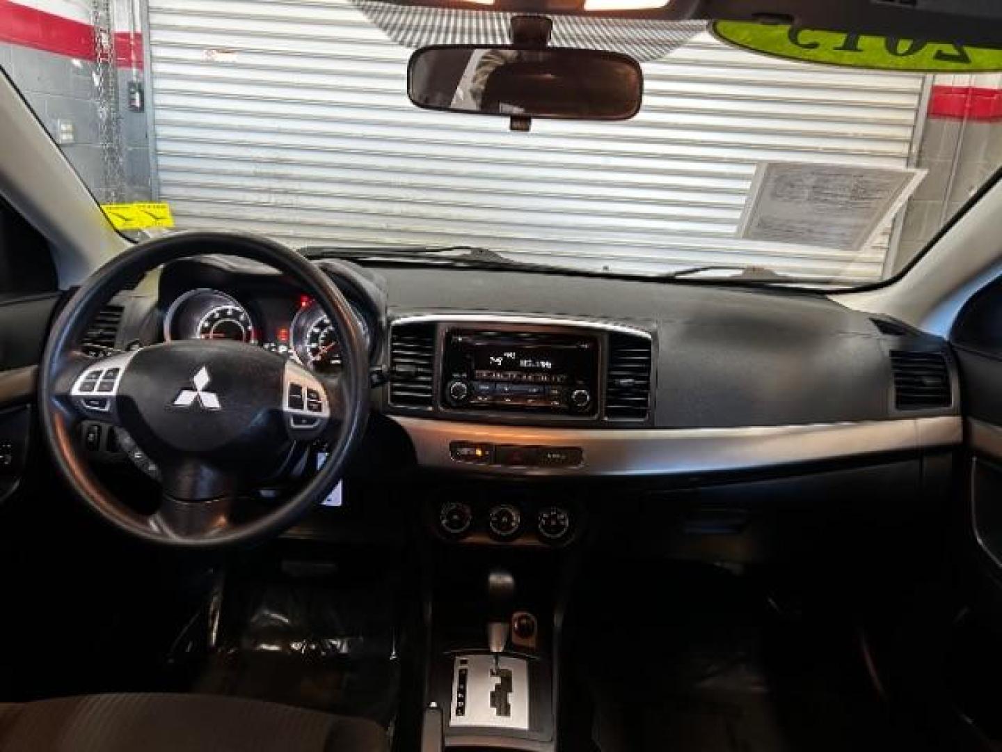 2015 Mitsubishi Lancer (JA32U2FU8FU) with an 4-Cyl 2.0 Liter engine, Automatic CVT transmission, located at 412 Auto Vista Drive, Palmdale, 93551, (661) 945-0620, 34.592636, -118.136681 - Photo#11