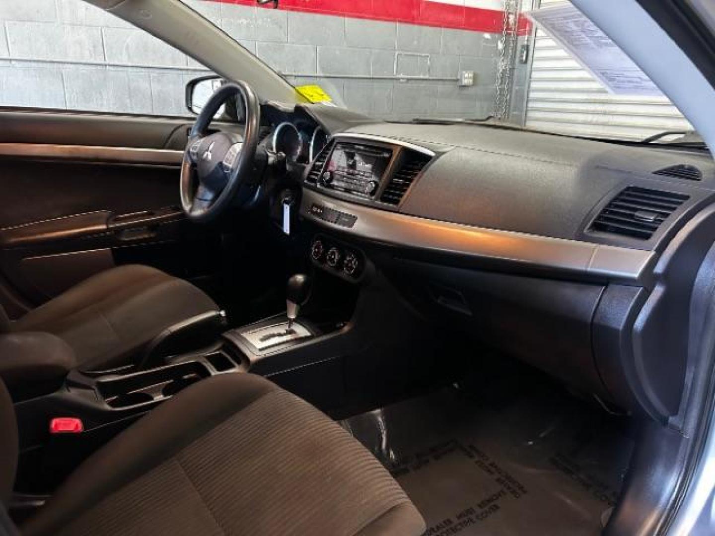 2015 Mitsubishi Lancer (JA32U2FU8FU) with an 4-Cyl 2.0 Liter engine, Automatic CVT transmission, located at 412 Auto Vista Drive, Palmdale, 93551, (661) 945-0620, 34.592636, -118.136681 - Photo#14