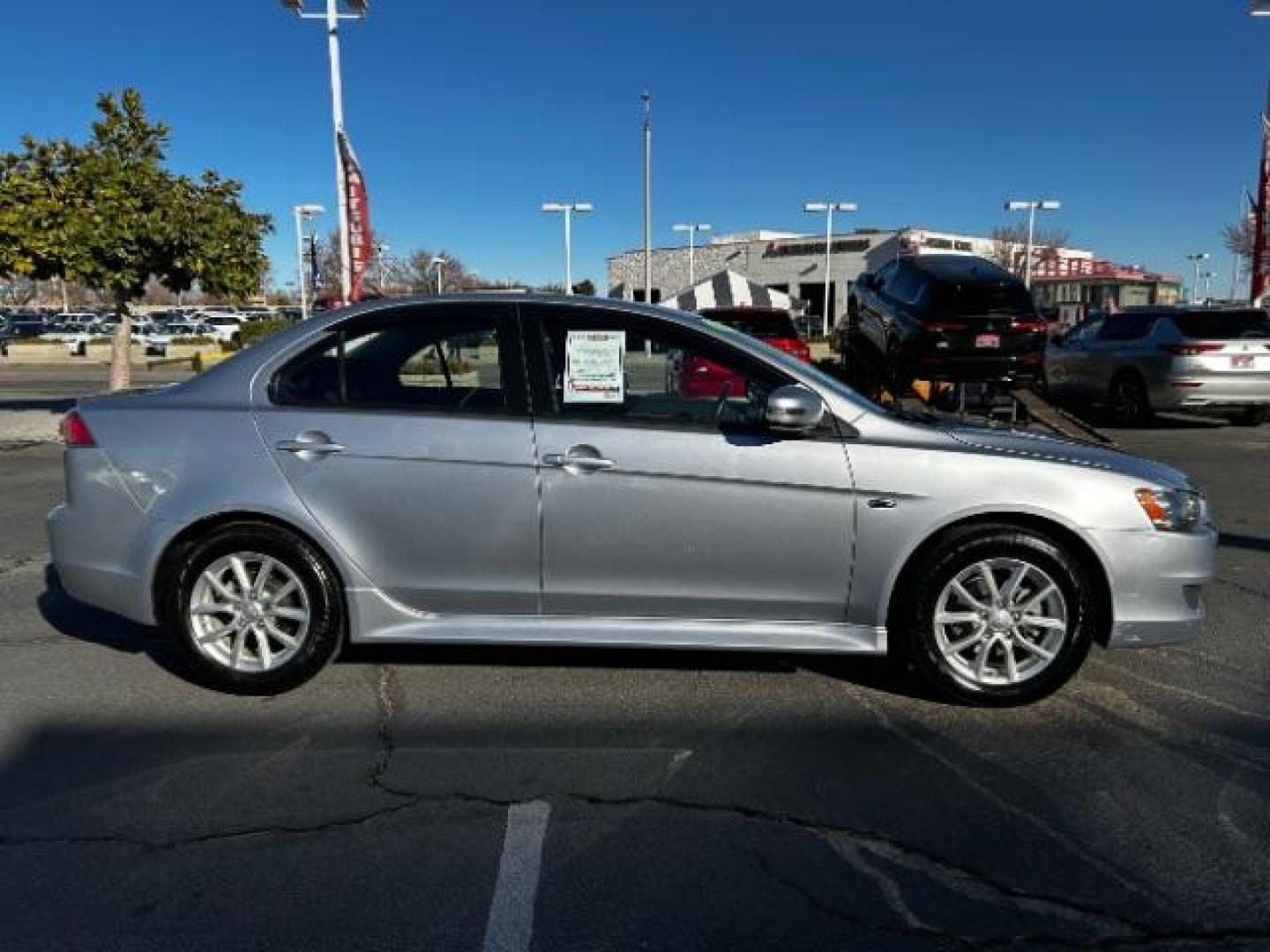 2015 Mitsubishi Lancer (JA32U2FU8FU) with an 4-Cyl 2.0 Liter engine, Automatic CVT transmission, located at 412 Auto Vista Drive, Palmdale, 93551, (661) 945-0620, 34.592636, -118.136681 - Photo#8