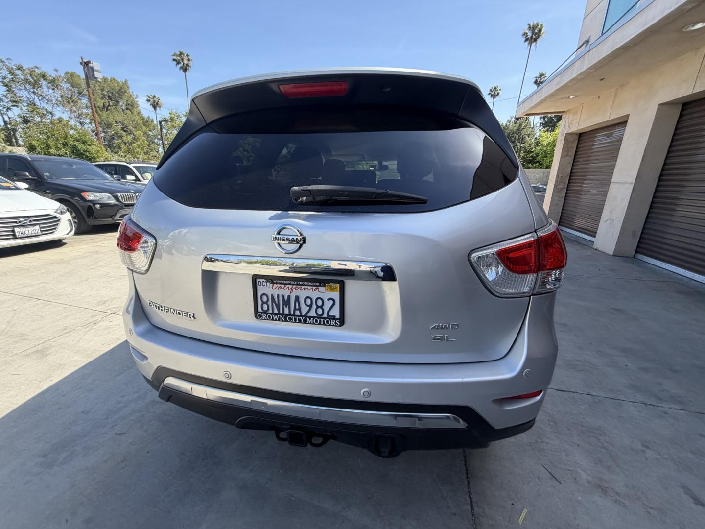 2015 Silver Nissan Pathfinder (5N1AR2MM6FC) , AUTOMATIC transmission, located at 30 S. Berkeley Avenue, Pasadena, CA, 91107, (626) 248-7567, 34.145447, -118.109398 - Crown City Motors is a used “Buy Here Pay Here” car dealer in Pasadena CA. “Buy Here Pay Here” financing, means that when you purchase your vehicle from our dealership, that you make the payments to the dealership as well. We do not need the banks approval to get you approved for a used auto - Photo#3