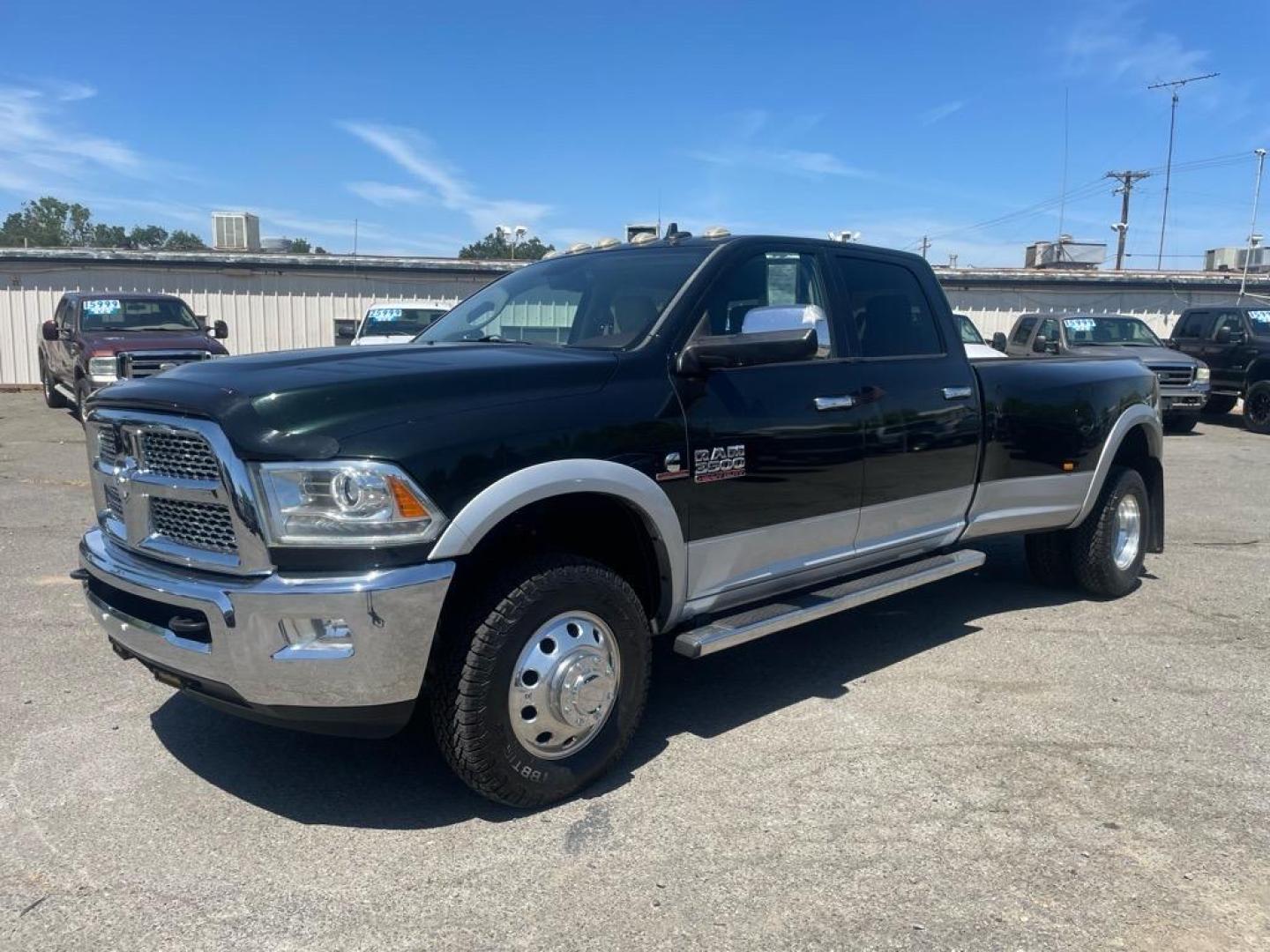 2015 Black Forest Green Pearl Coat/Bright Silver Metall RAM 3500 Laramie (3C63RRJL4FG) with an 6.7L Cummins 6.7L Diesel Turbo I6 350hp 660ft. lbs. Common Rail Direct Injection engine, Automatic transmission, located at 800 Riverside Ave, Roseville, CA, 95678, 916-773-4549 & Toll Free: 866-719-4393, 38.732265, -121.291039 - CUMMINS DIESEL CREW CAB DUALLY 4X4 LARAMIE - Photo#0